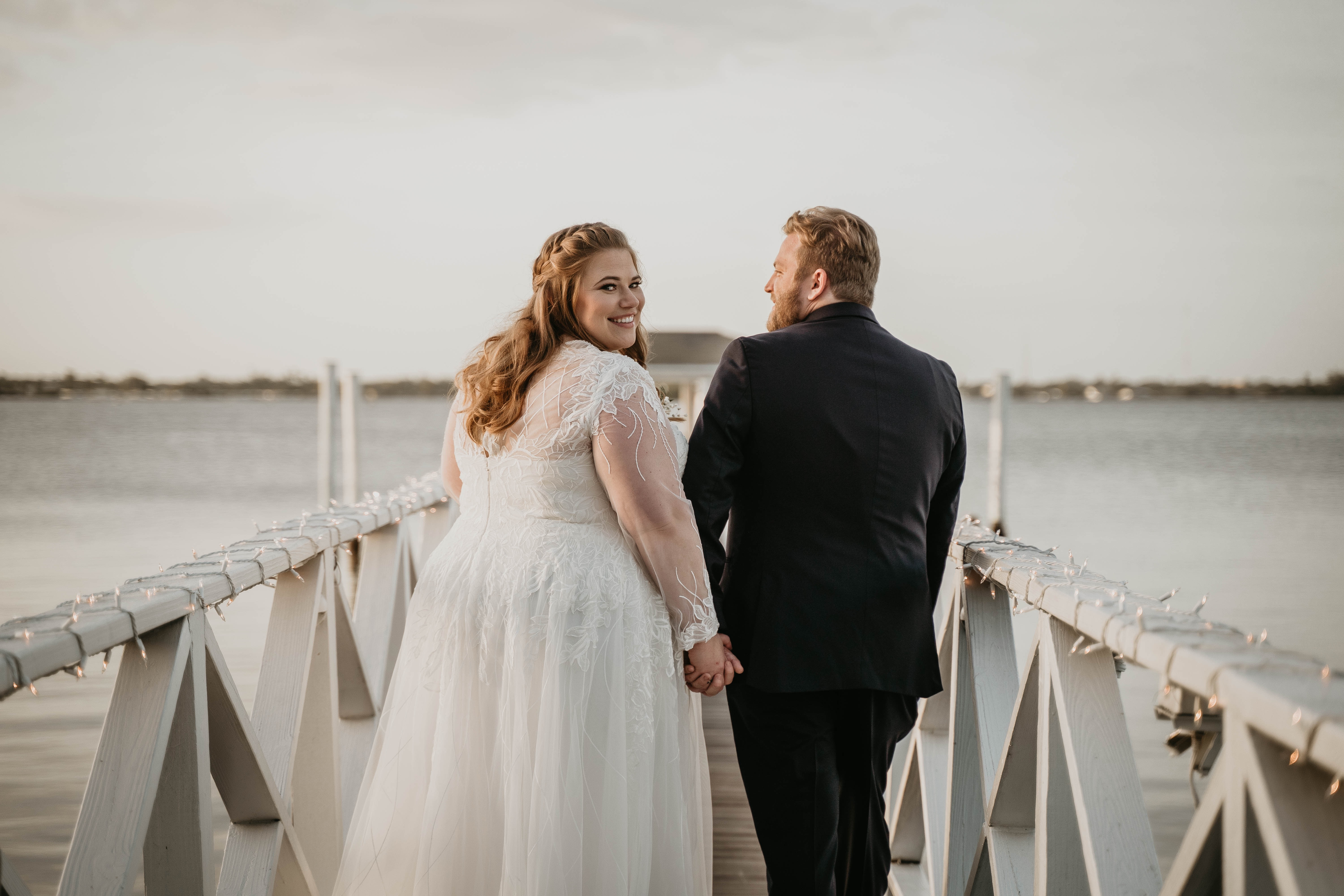 Bride and Groom Waterfront Wedding Portraits at the Heitman House