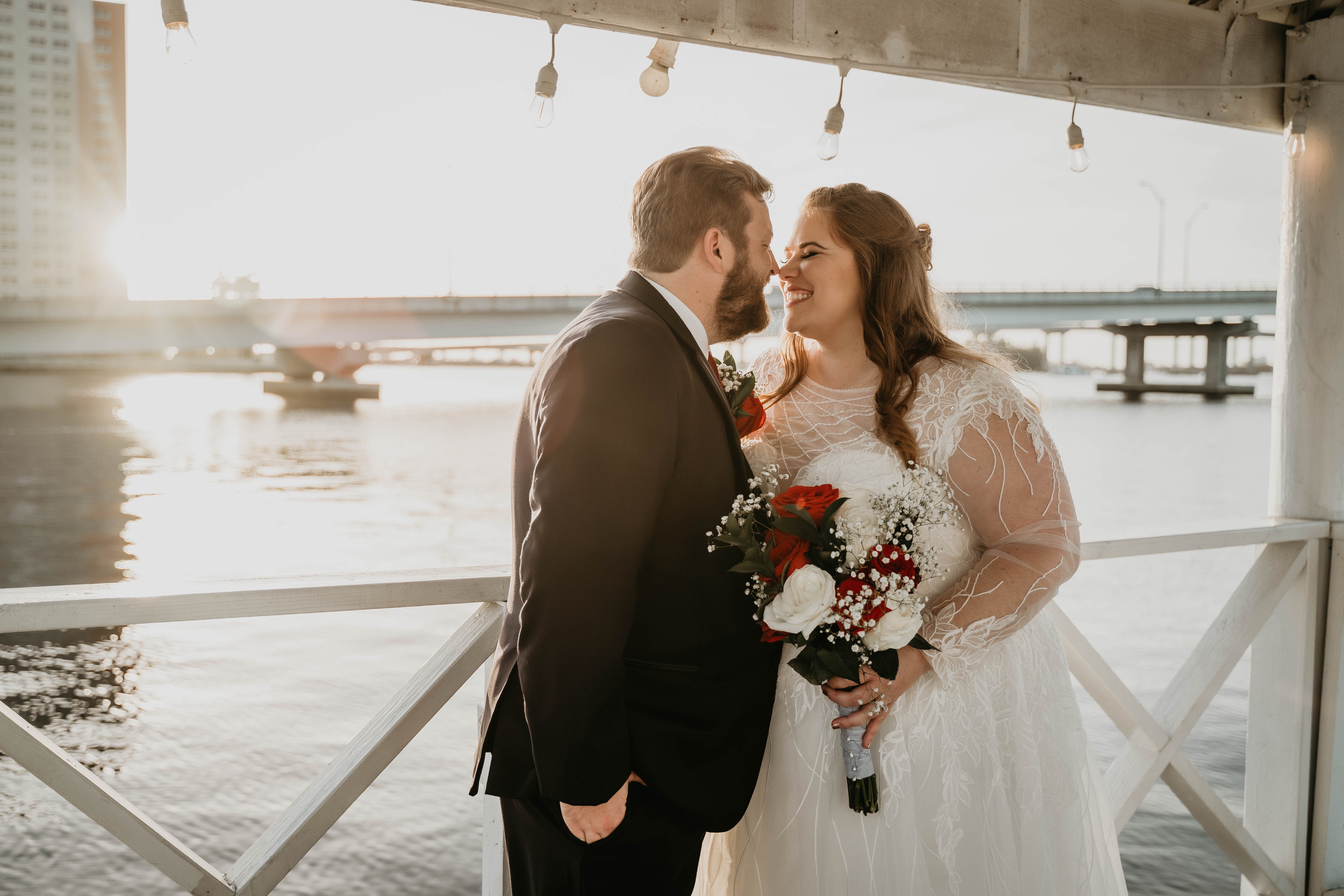 Bride and Groom Waterfront Wedding Portraits at the Heitman House