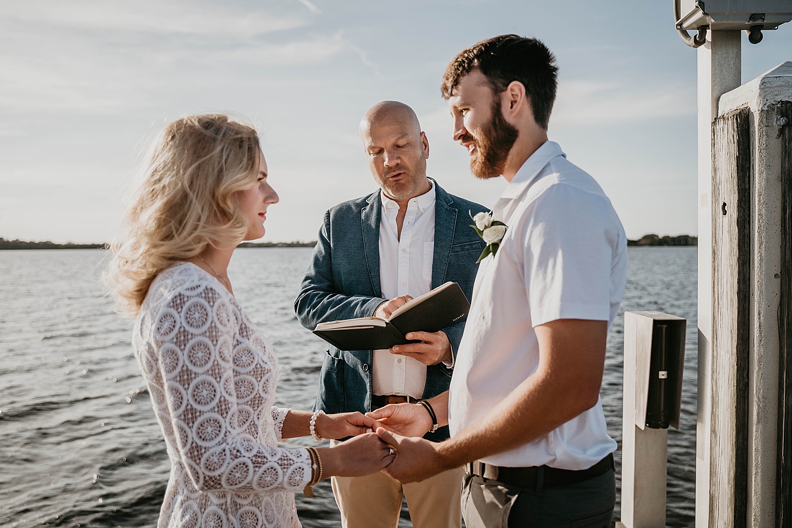 South Florida Waterfront Elopement ceremony vows captured by South Florida Elopement Photographer, Krystal Capone Photography