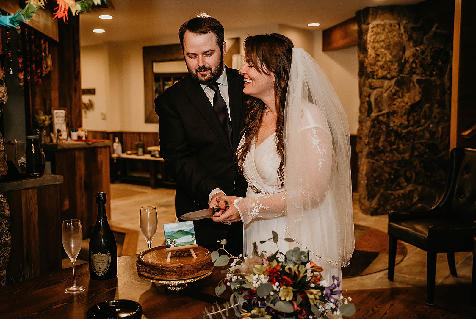 Rustic Colorado Elopement Reception Cake Cutting by Krystal Capone Photography