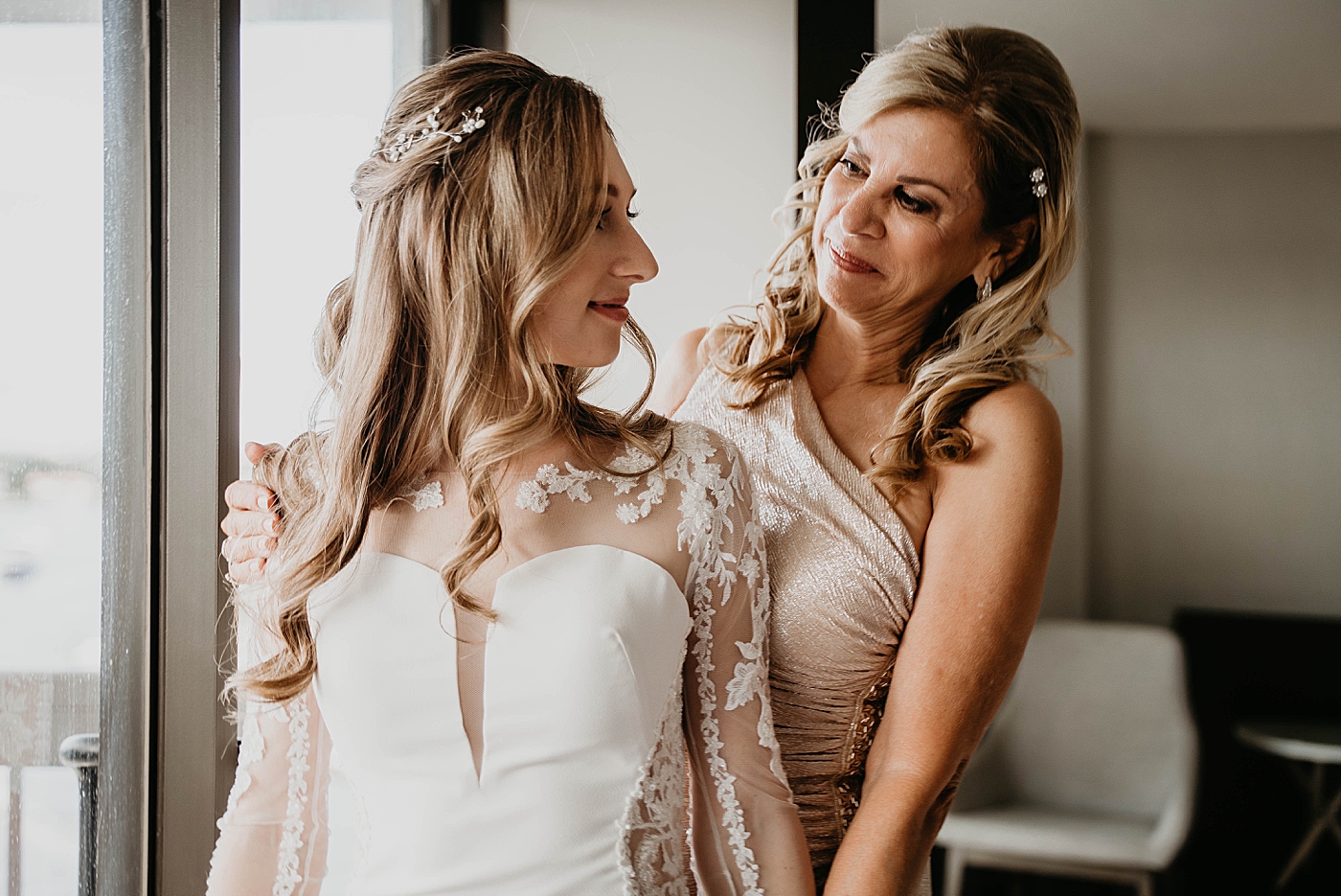 Bride and family getting ready Waterstone Resort and Marina Wedding captured by South Florida Wedding Photographer Krystal Capone Photography