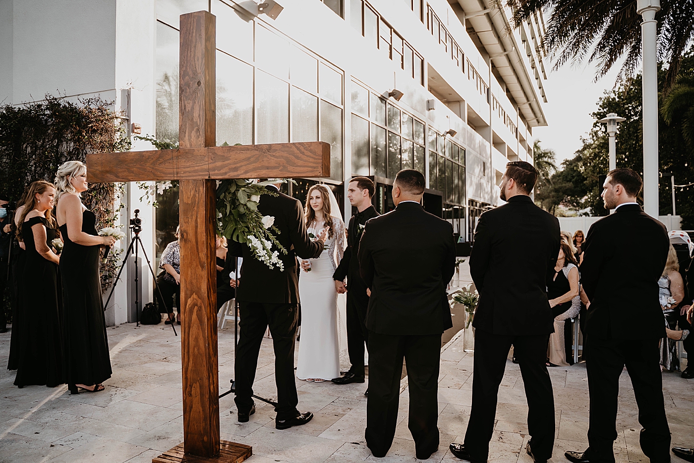 Wideshot of Bride and Groom at the Ceremony Waterstone Resort and Marina Wedding captured by South Florida Wedding Photographer Krystal Capone Photography