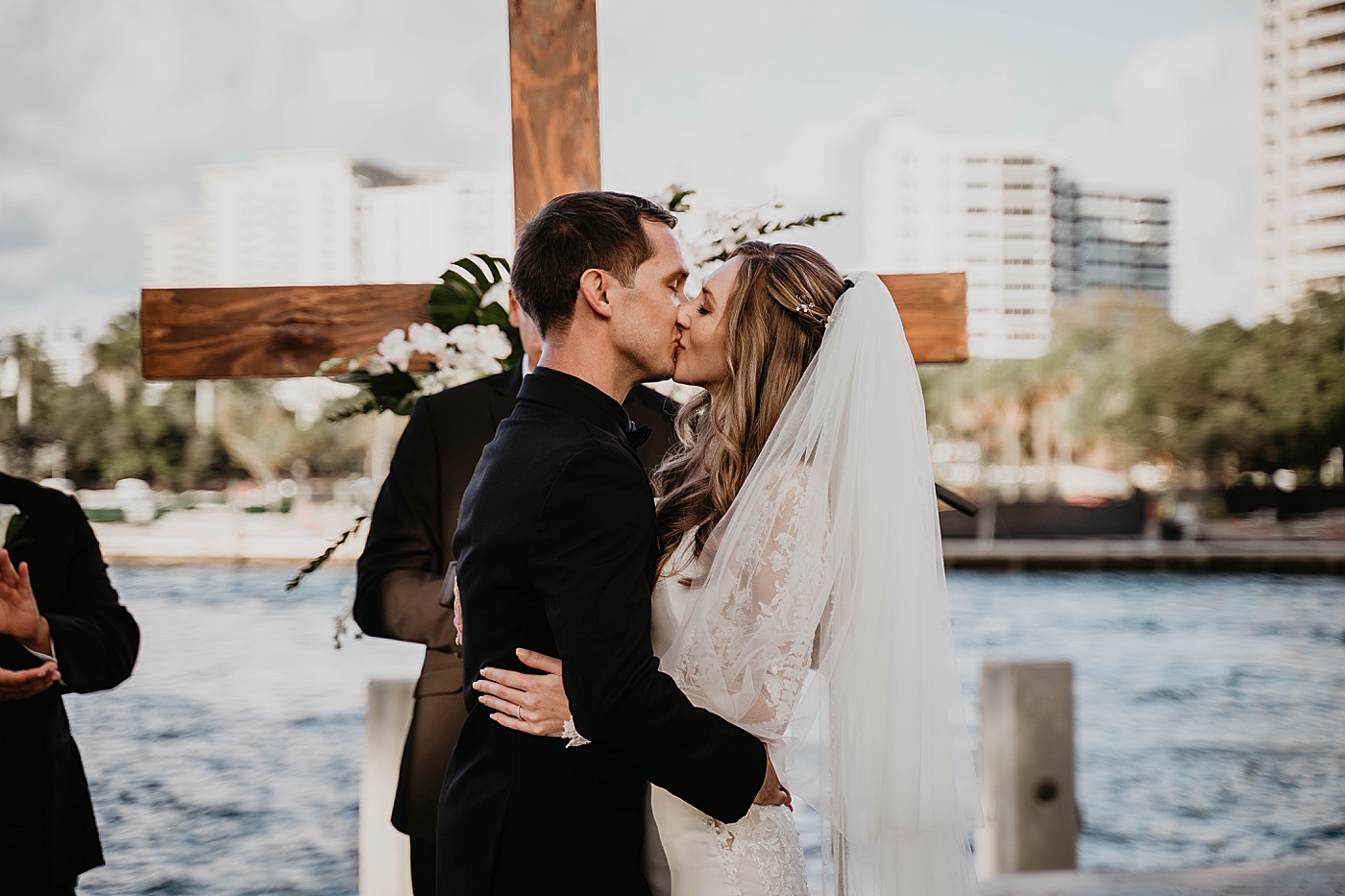 Just married Bride and Groom kissing Ceremony Waterstone Resort and Marina Wedding captured by South Florida Wedding Photographer Krystal Capone Photography