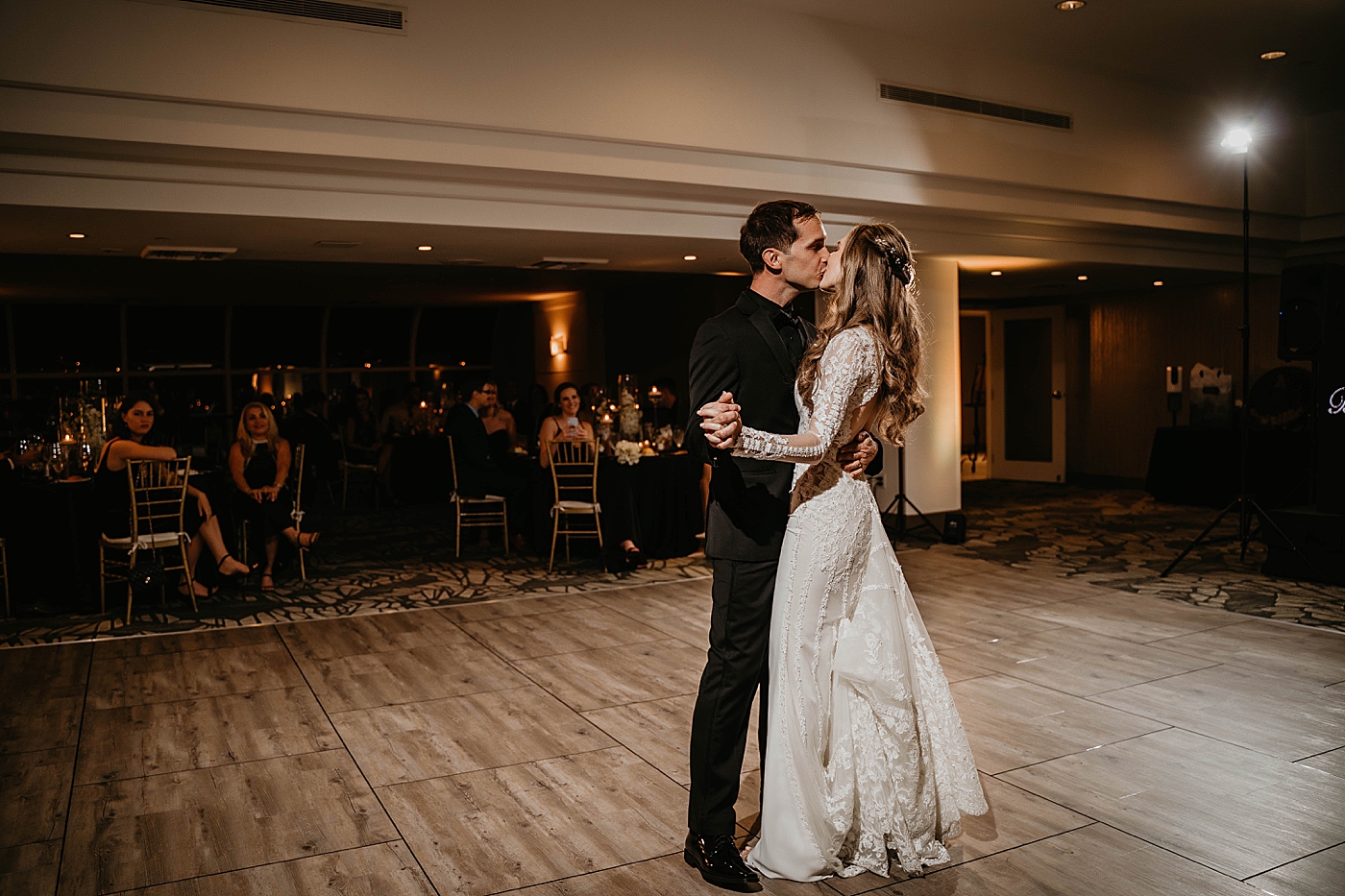 First Dance Bride and Groom kissing Waterstone Resort and Marina Wedding captured by South Florida Wedding Photographer Krystal Capone Photography