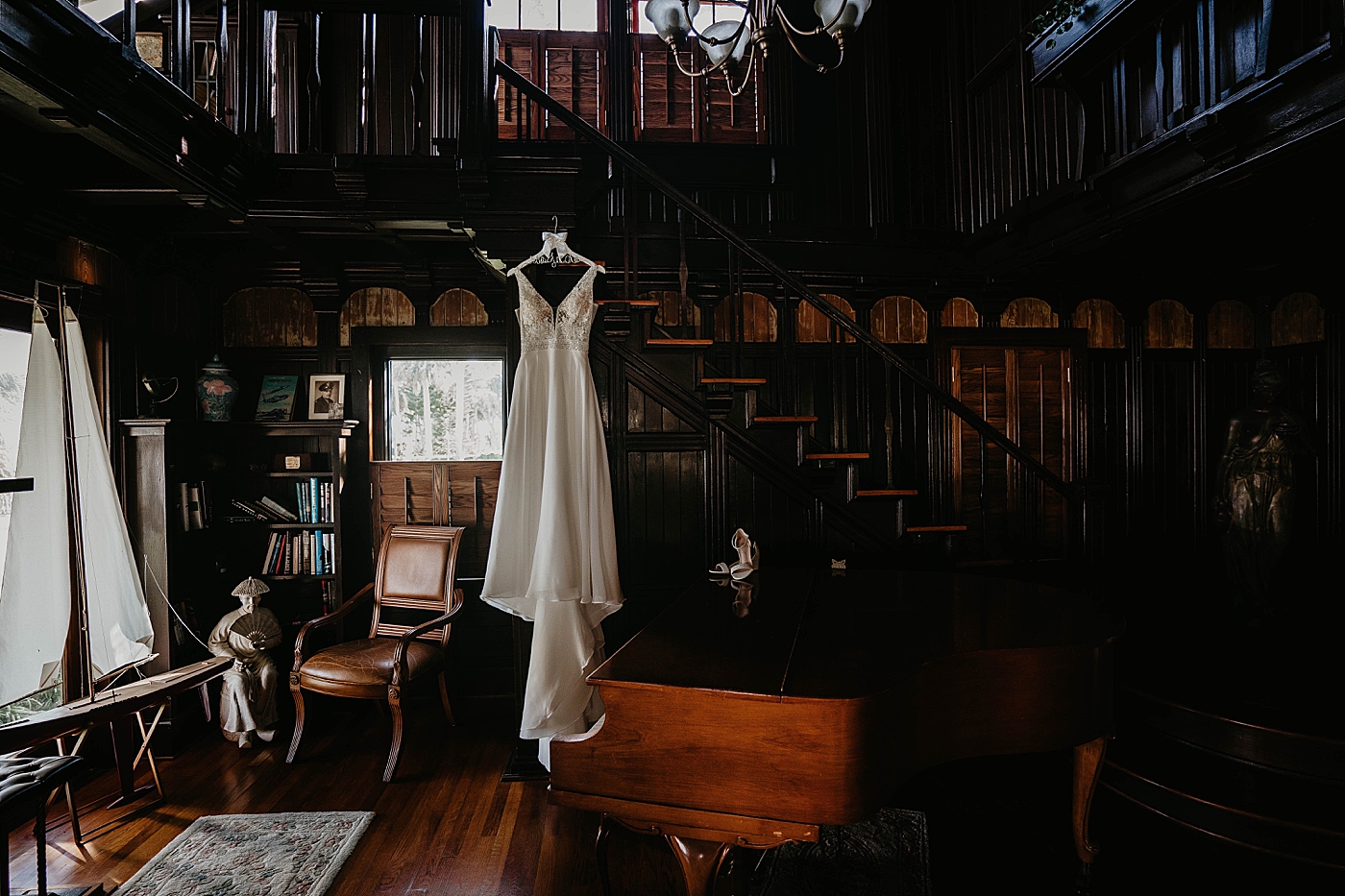 Detail shot of wedding dress hanging The Estate on the Halifax Wedding Photography captured by South Florida Wedding Photographer Krystal Capone Photography 
