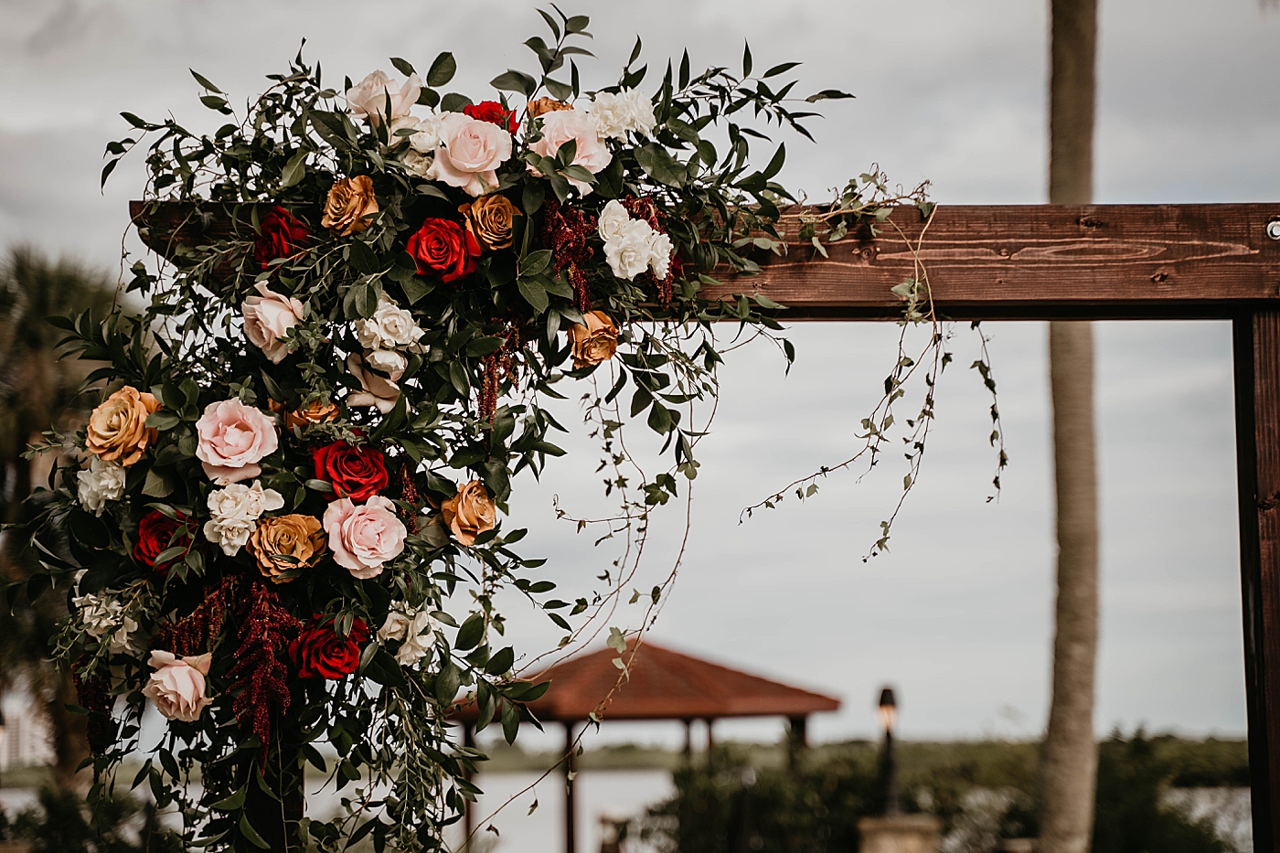 Floral arch detail shot The Estate on the Halifax Wedding Photography captured by South Florida Wedding Photographer Krystal Capone Photography 