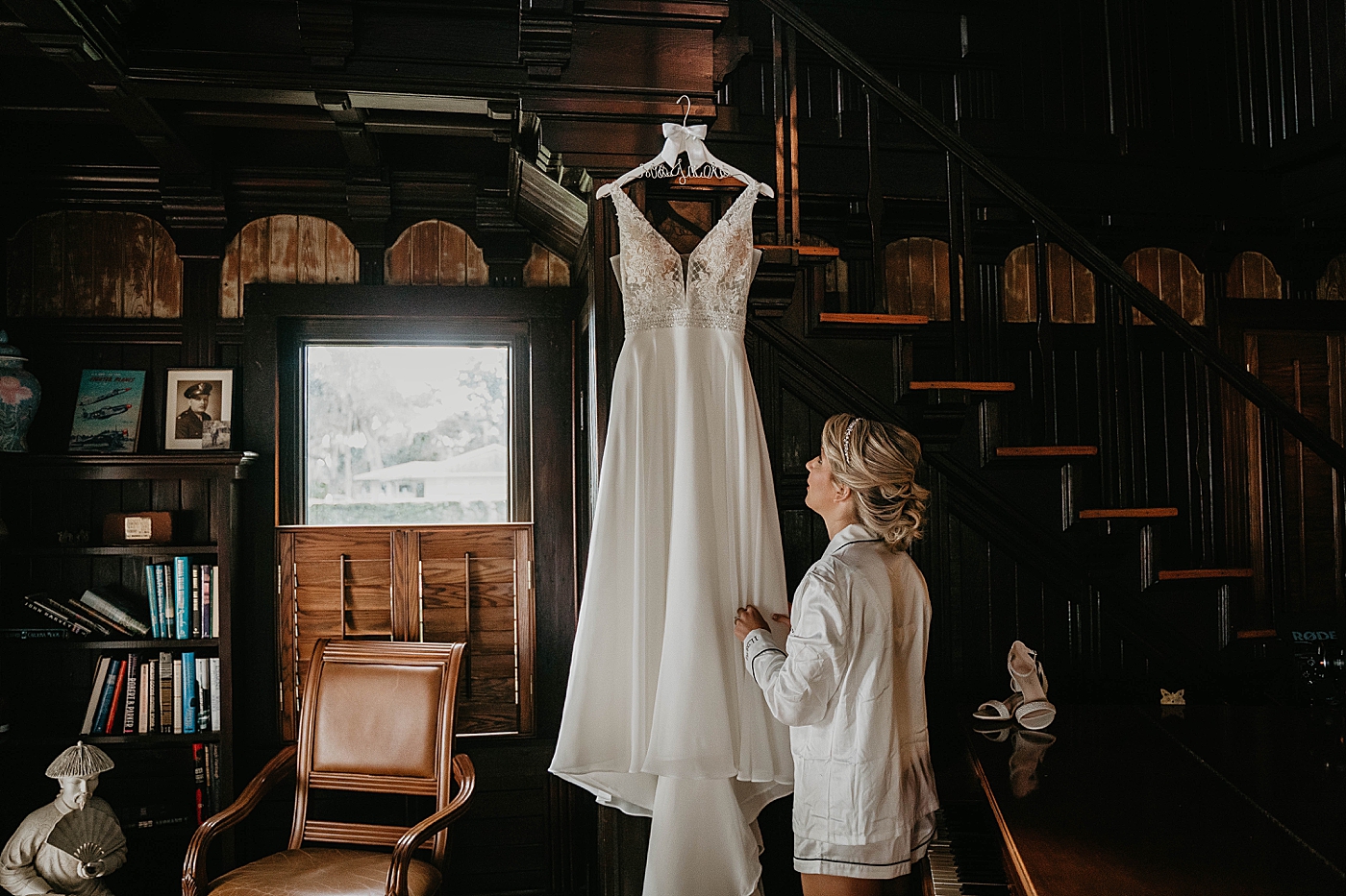 Bride looking at wedding dress The Estate on the Halifax Wedding Photography captured by South Florida Wedding Photographer Krystal Capone Photography 