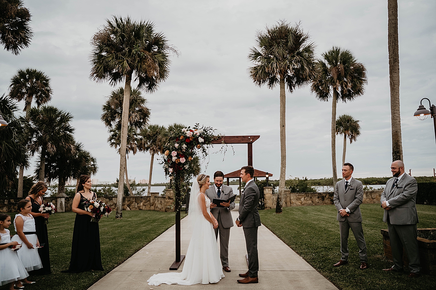 Wide shot of Bride and Groom at Ceremony alter The Estate on the Halifax Wedding Photography captured by South Florida Wedding Photographer Krystal Capone Photography 