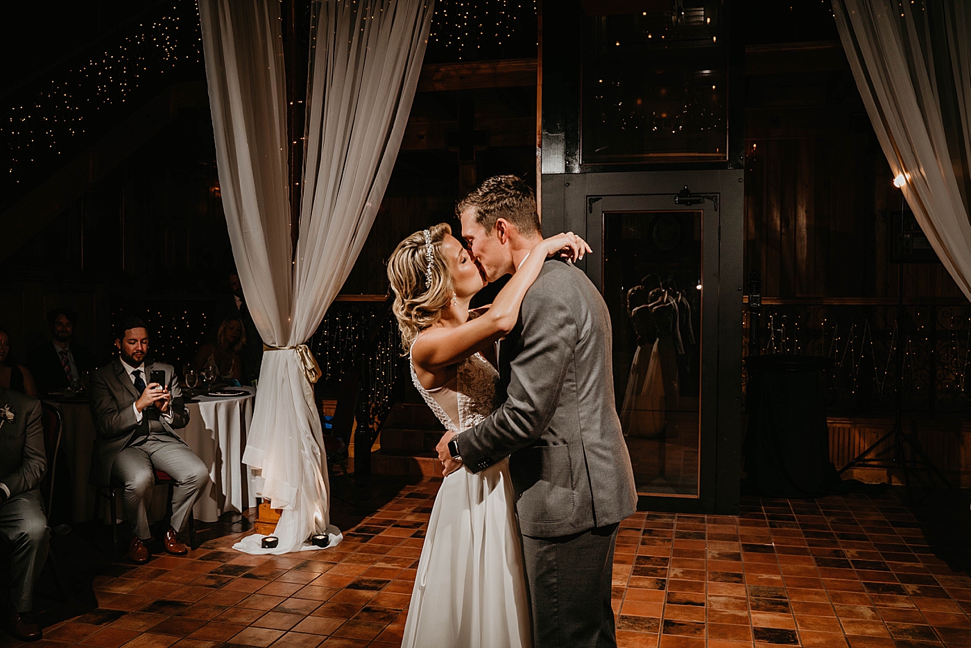 Bride and groom kissing First dance The Estate on the Halifax Wedding Photography captured by South Florida Wedding Photographer Krystal Capone Photography 
