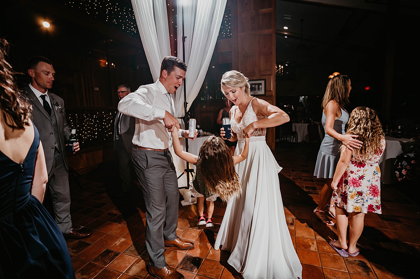 Bride and Groom dancing with kids at Reception The Estate on the Halifax Wedding Photography captured by South Florida Wedding Photographer Krystal Capone Photography 