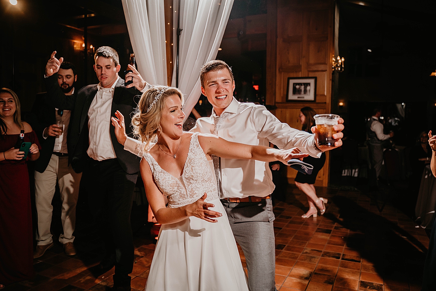 Bride and Groom dancing with drinks The Estate on the Halifax Wedding Photography captured by South Florida Wedding Photographer Krystal Capone Photography 