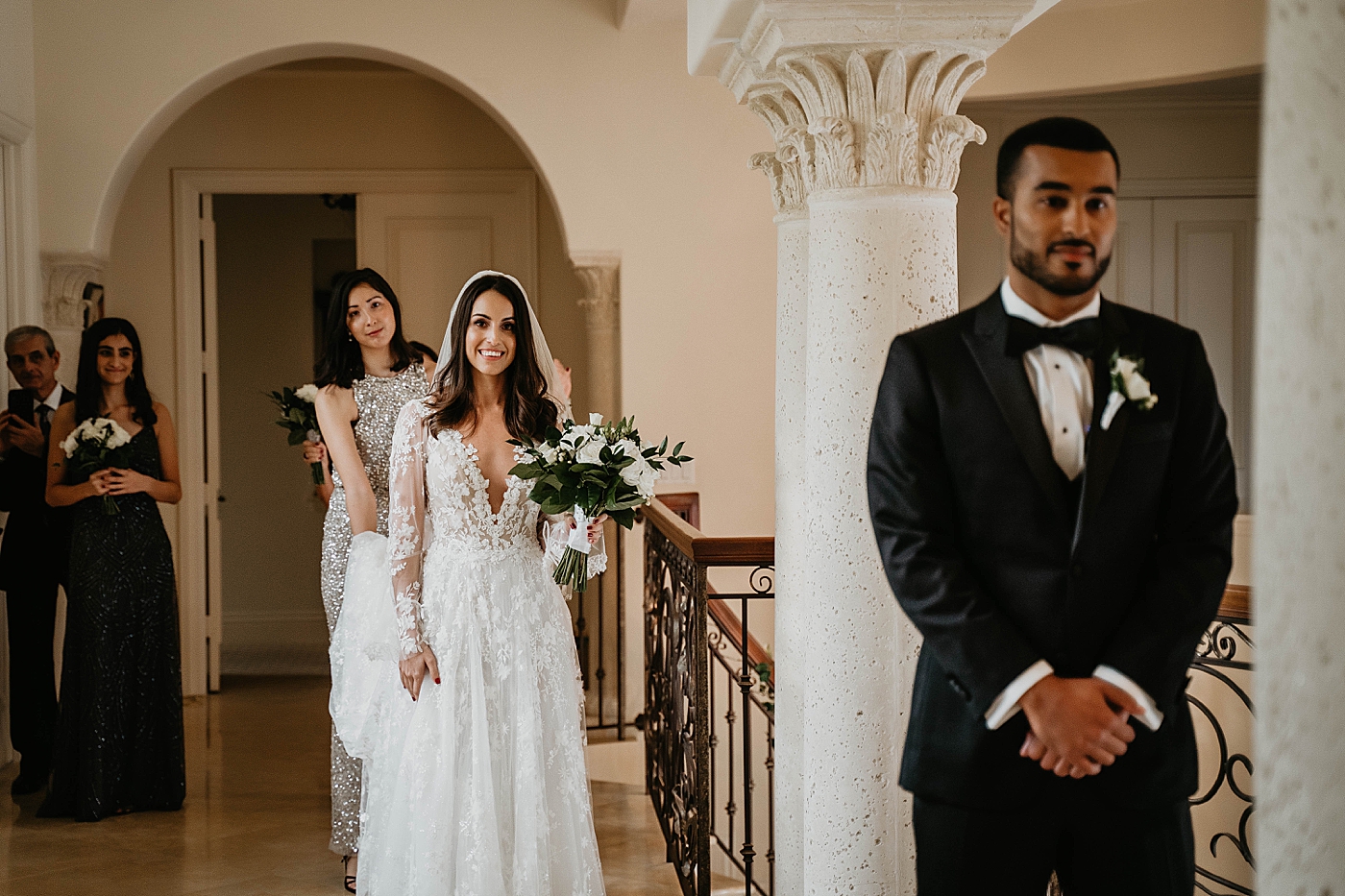 Groom with his back turned while Bride approaches for First Look Intimate Home Wedding captured by South Florida Wedding Photographer Krystal Capone Photography