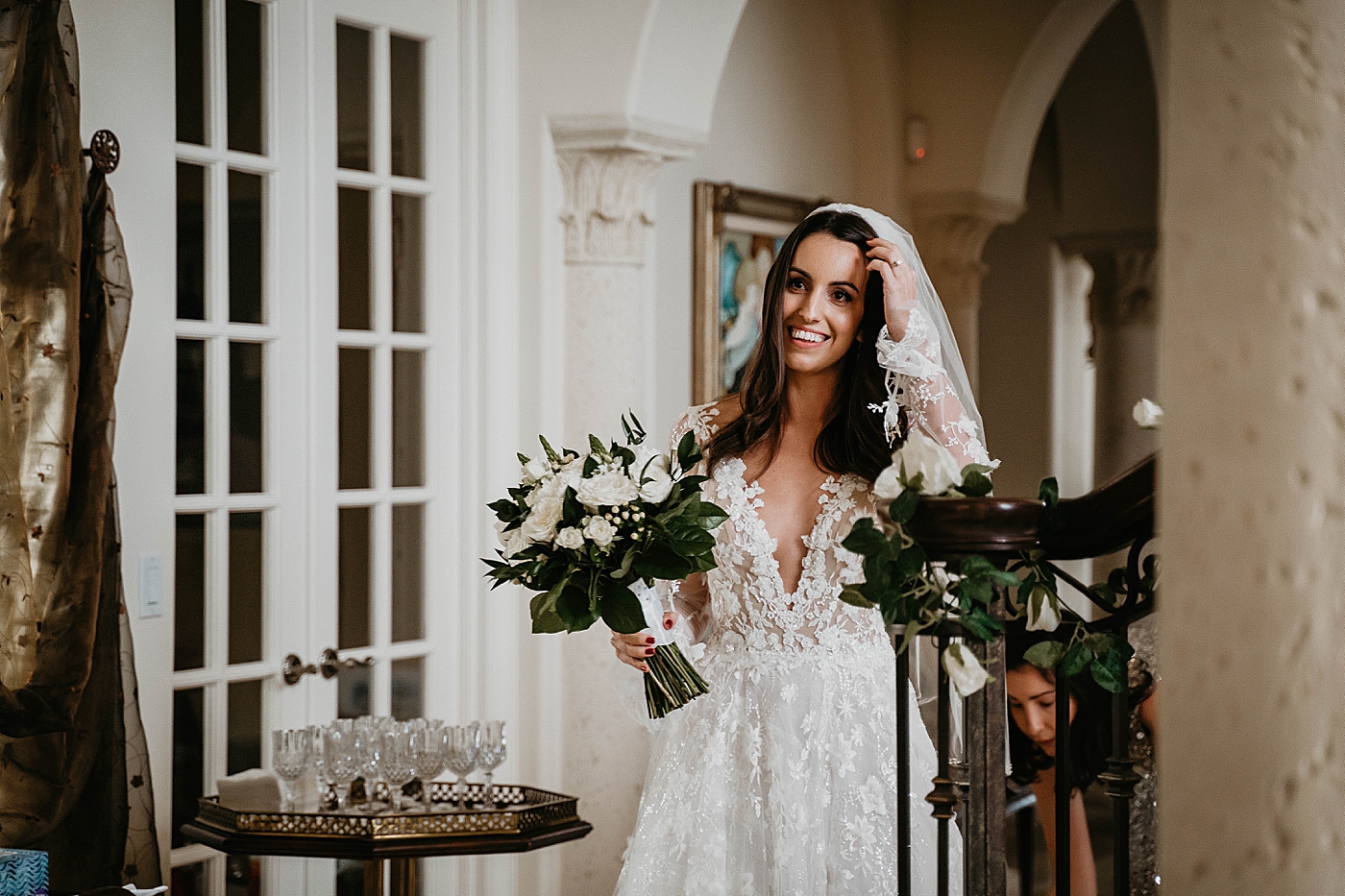 Birde with whie bouquet candid Intimate Home Wedding captured by South Florida Wedding Photographer Krystal Capone Photography