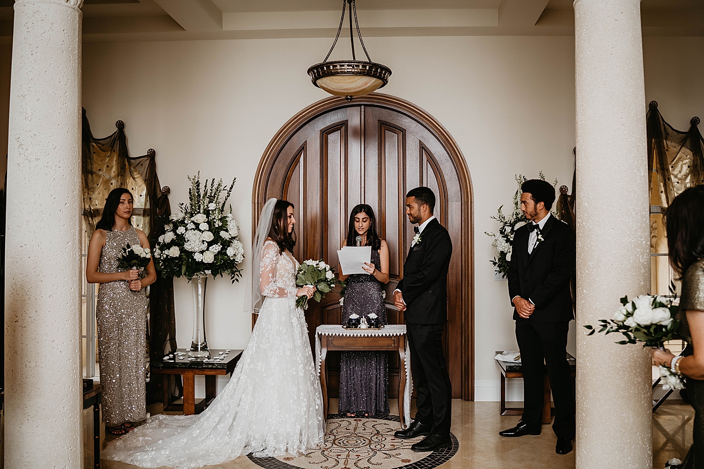 Ceremony homily indoor Intimate Home Wedding captured by South Florida Wedding Photographer Krystal Capone Photography