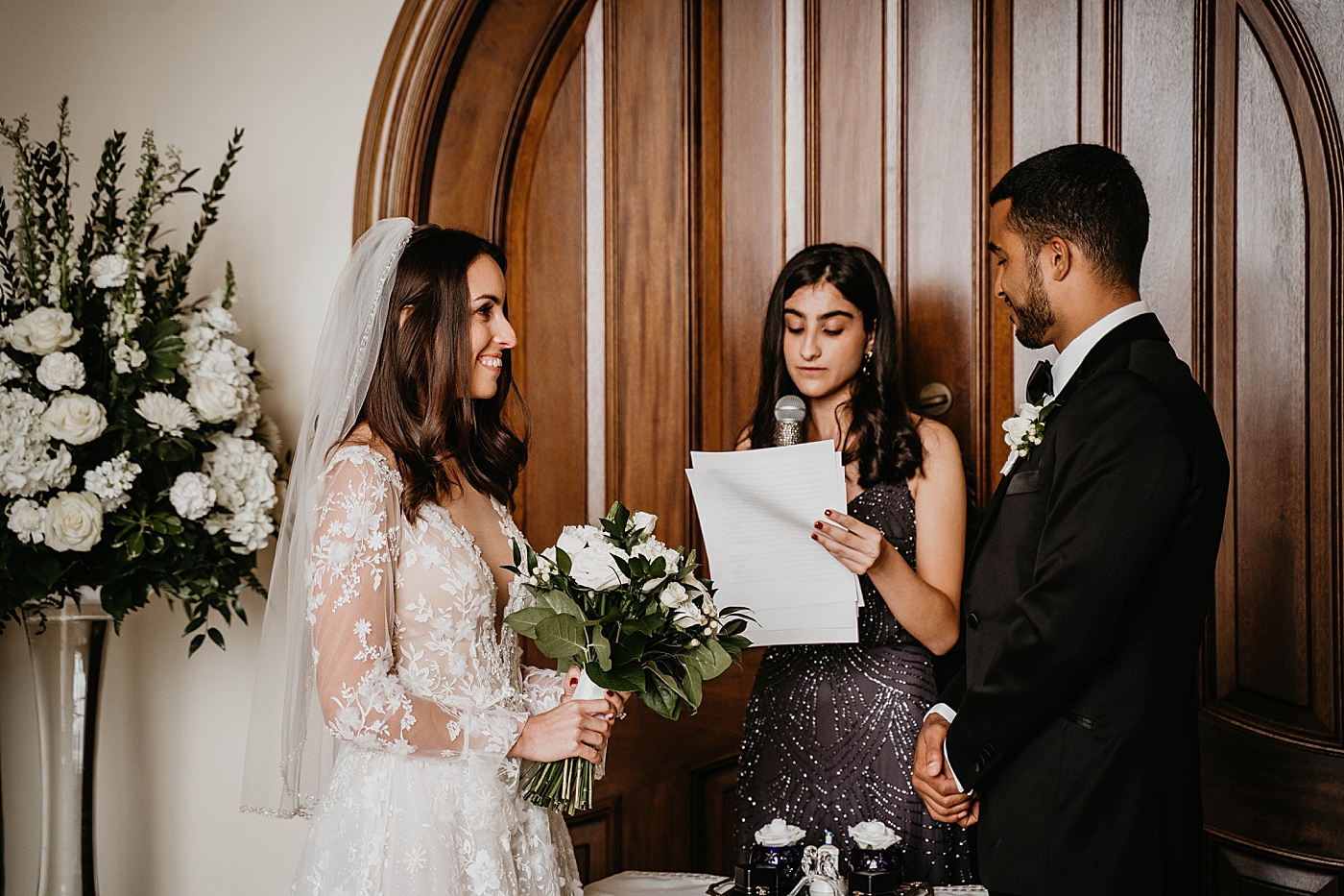 Bride and Groom saying their vows Intimate Home Wedding captured by South Florida Wedding Photographer Krystal Capone Photography