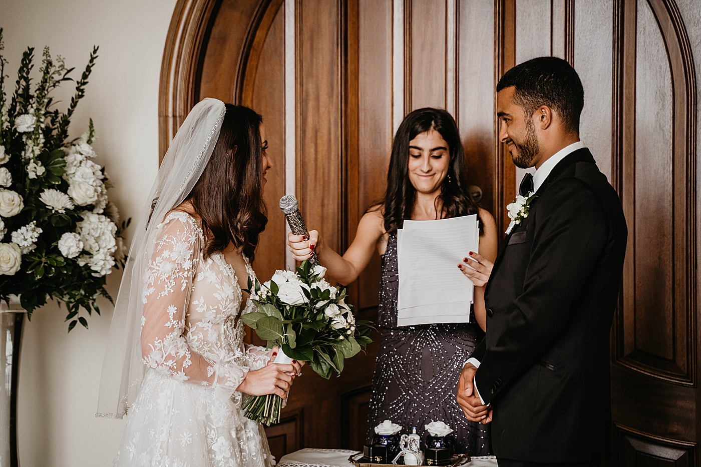 Bride and Groom saying I do Ceremony Intimate Home Wedding captured by South Florida Wedding Photographer Krystal Capone Photography