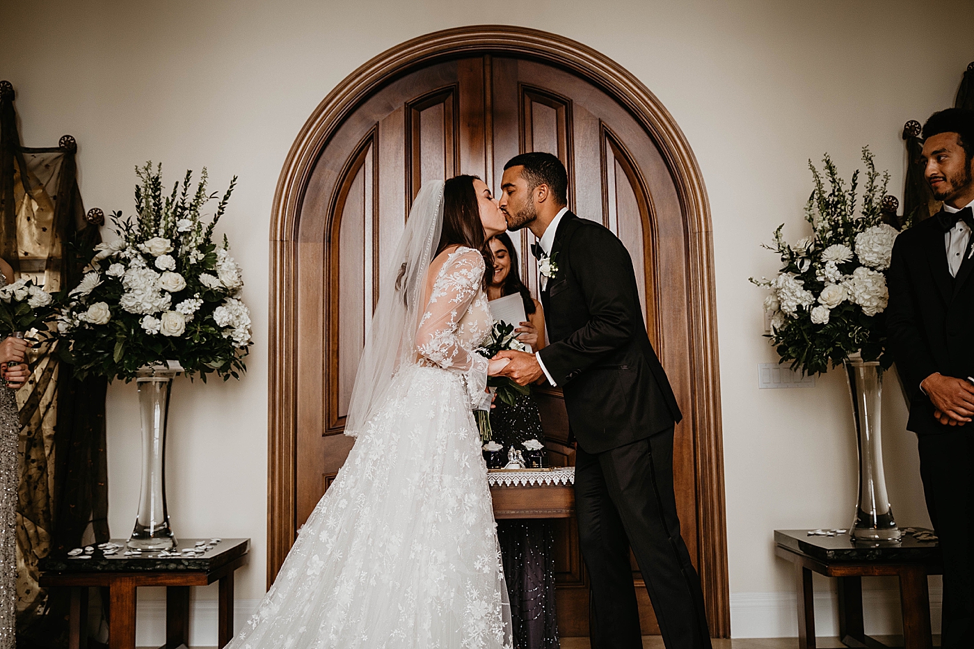 Bride and Groom Just married kissing Intimate Home Wedding captured by South Florida Wedding Photographer Krystal Capone Photography