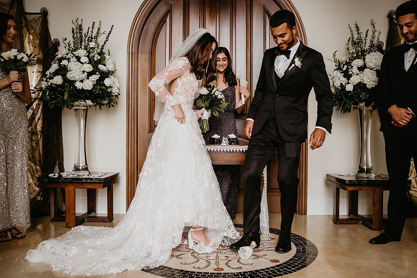Bride and Groom having a fun moment during ceremony Intimate Home Wedding captured by South Florida Wedding Photographer Krystal Capone Photography