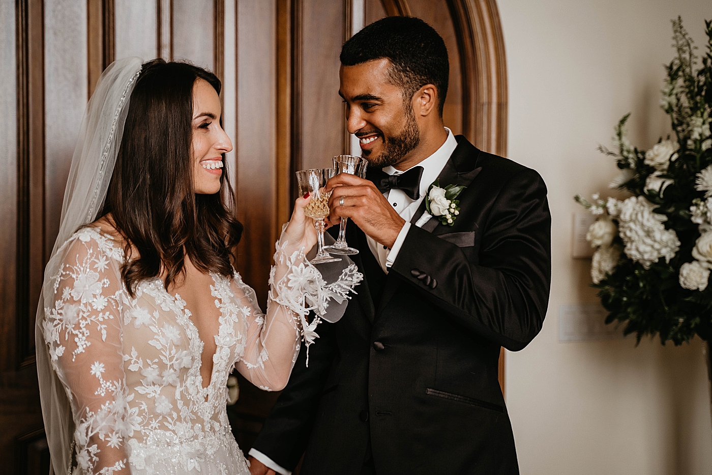 Bride and Groom having a cheers Intimate Home Wedding captured by South Florida Wedding Photographer Krystal Capone Photography