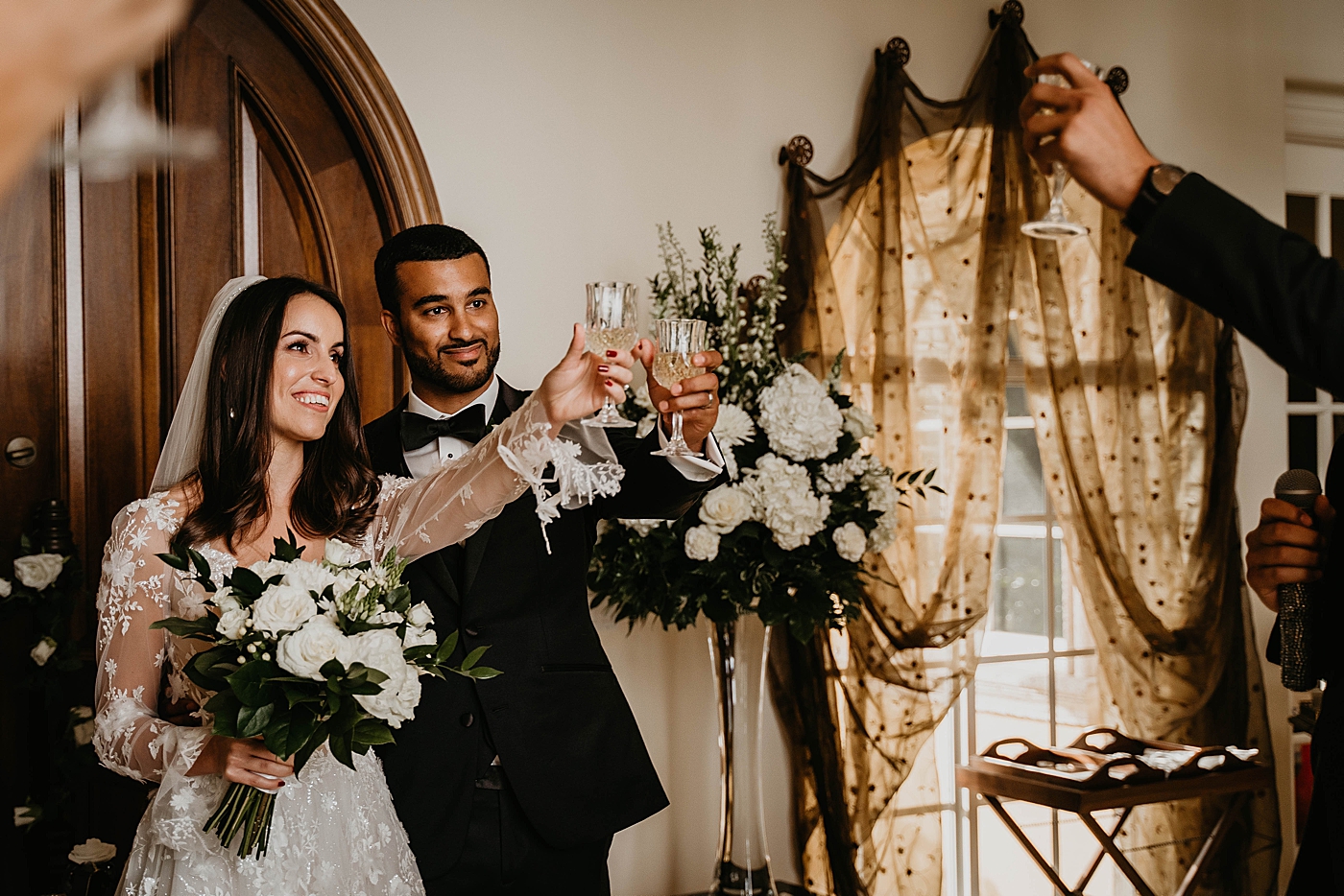 Best man cheers Intimate Home Wedding captured by South Florida Wedding Photographer Krystal Capone Photography