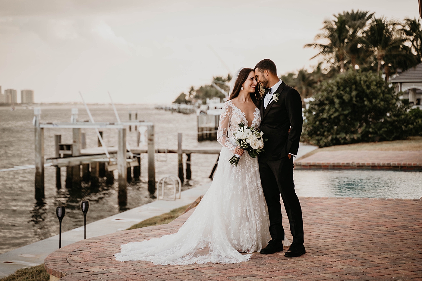 Bride and Groom portrait by the oceanside Intimate Home Wedding captured by South Florida Wedding Photographer Krystal Capone Photography