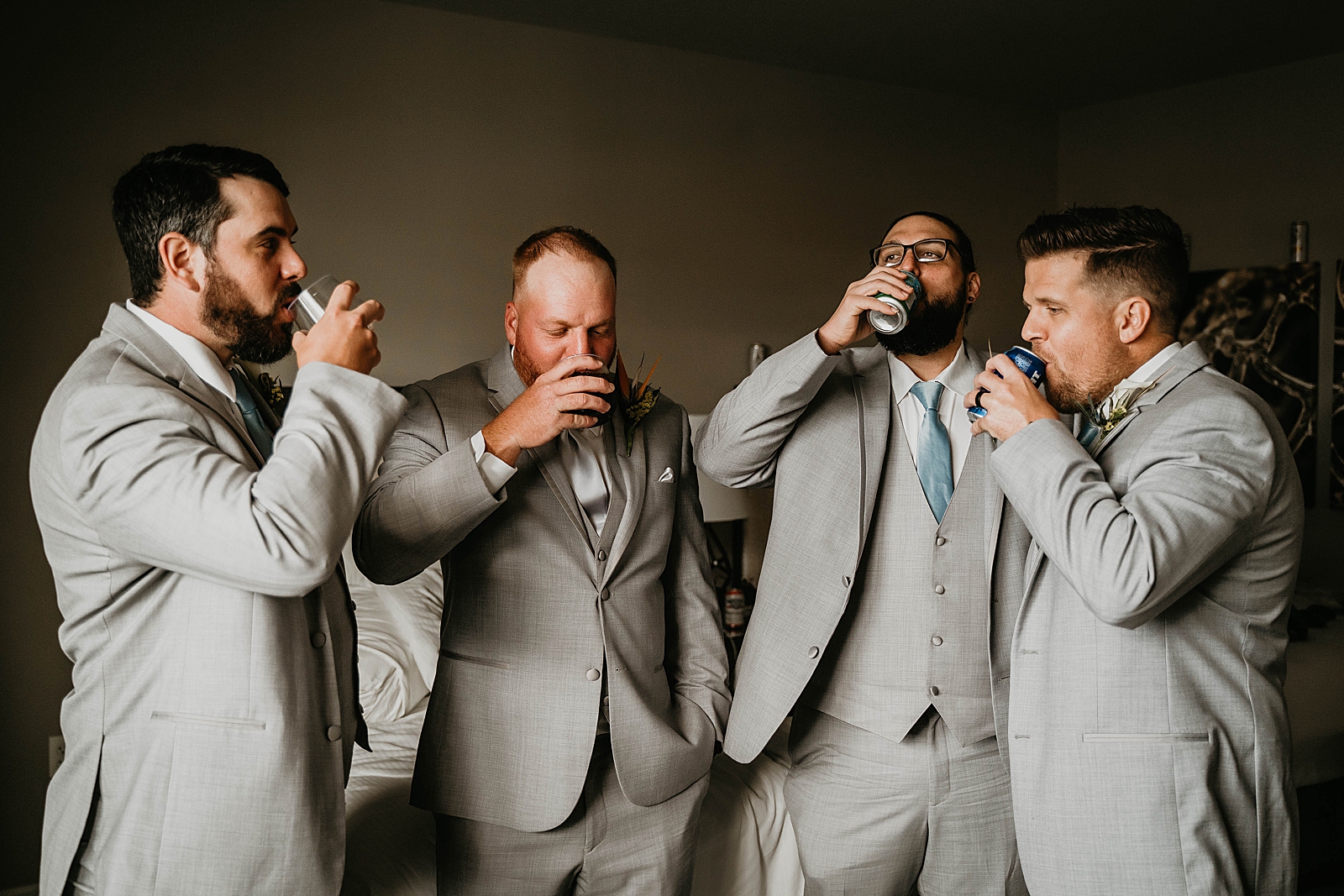 Groom and Groomsmen having a drink Jupiter Lighthouse Wedding Photography captured by South Florida Wedding Photographer Krystal Capone Photography