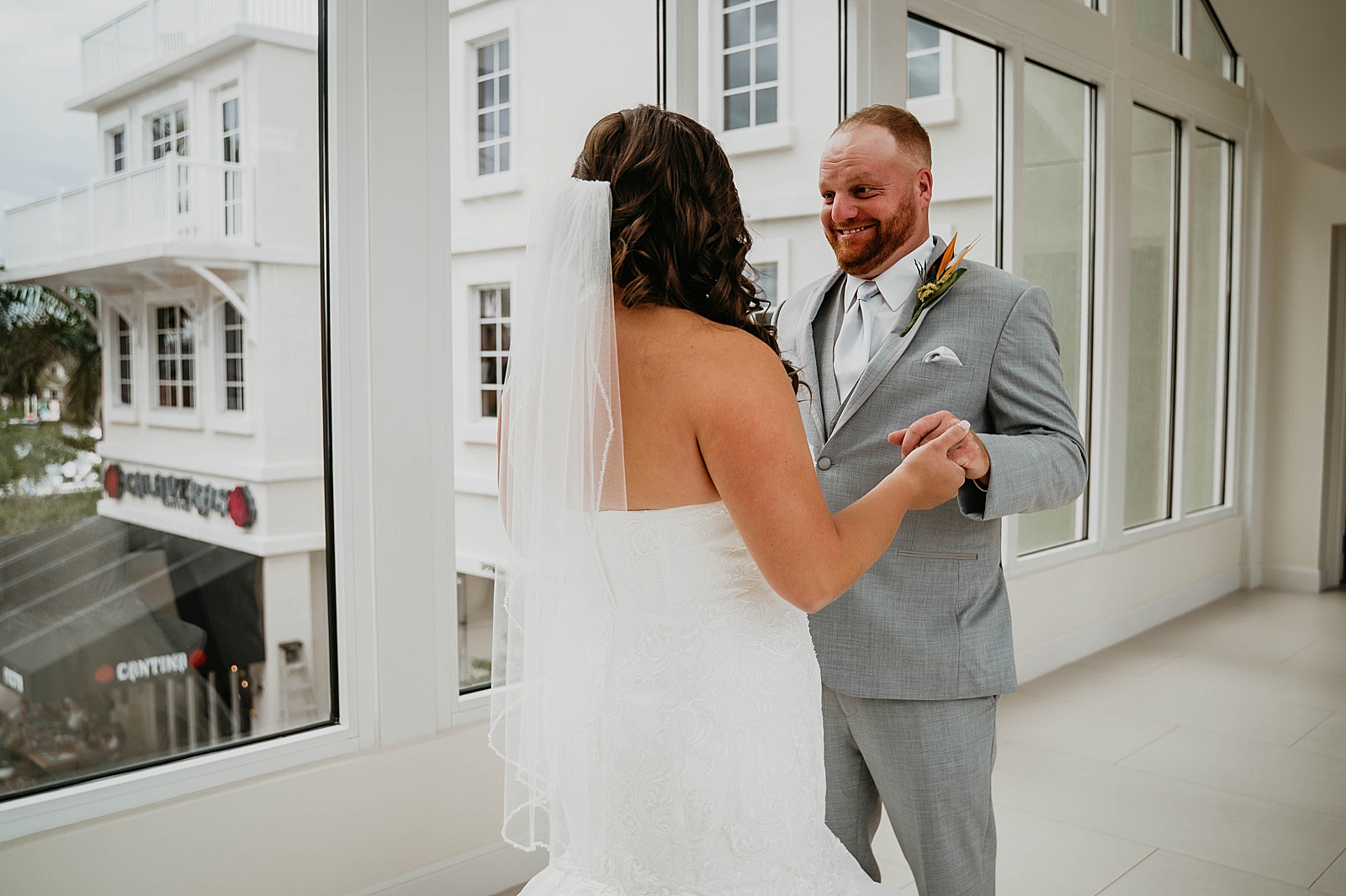 Groom overjoyed to see Bride Jupiter Lighthouse Wedding Photography captured by South Florida Wedding Photographer Krystal Capone Photography
