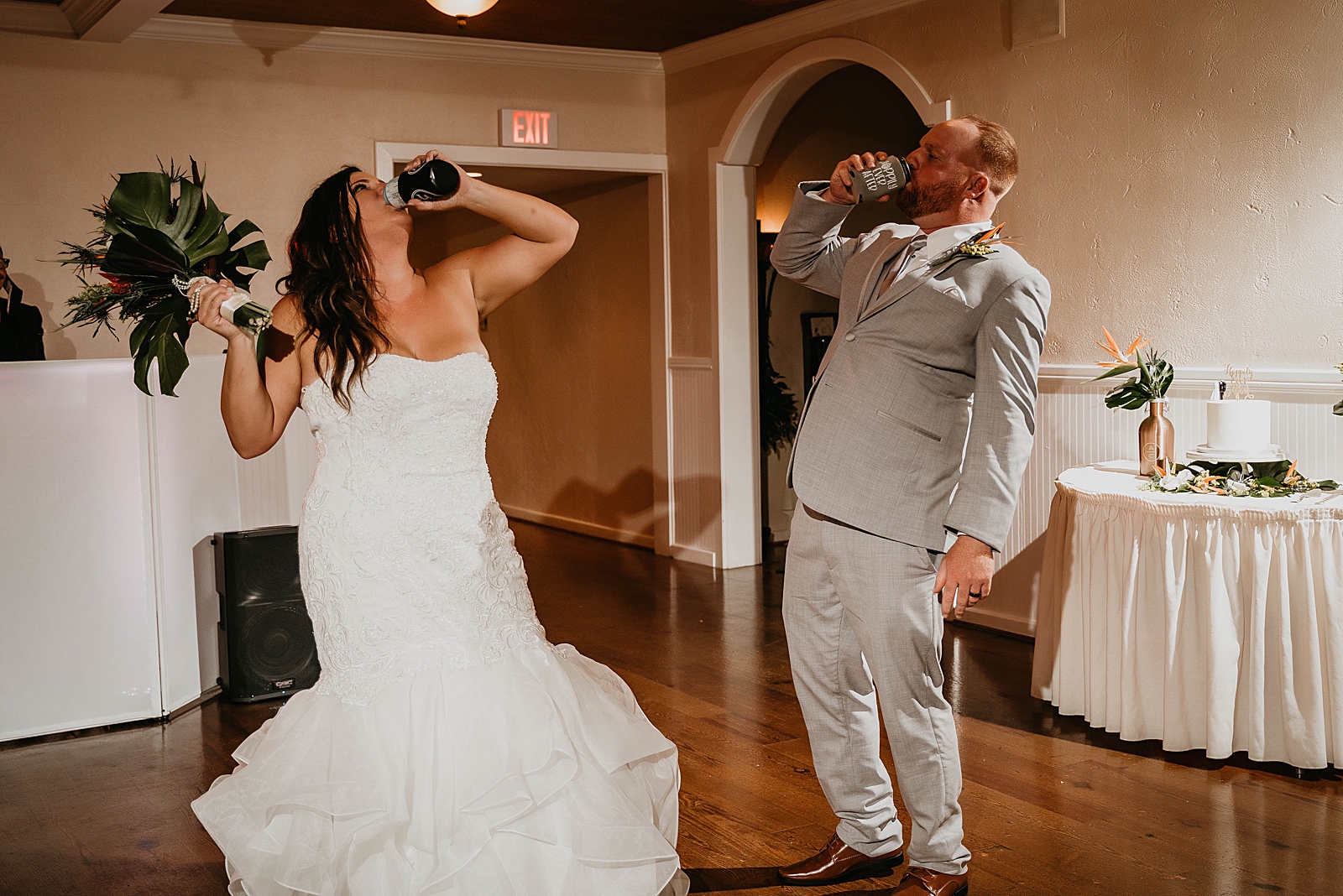 Bride and Groom having a drink after the first drink Jupiter Lighthouse Wedding Photography captured by South Florida Wedding Photographer Krystal Capone Photography