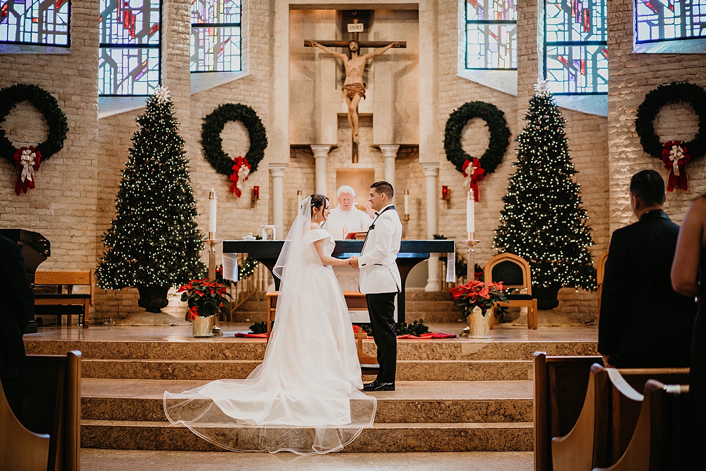 Bride and Groom holding hands looking at each other Ceremony Lavan Venue Wedding Photography captured by South Florida Wedding Photographer Krystal Capone Photography