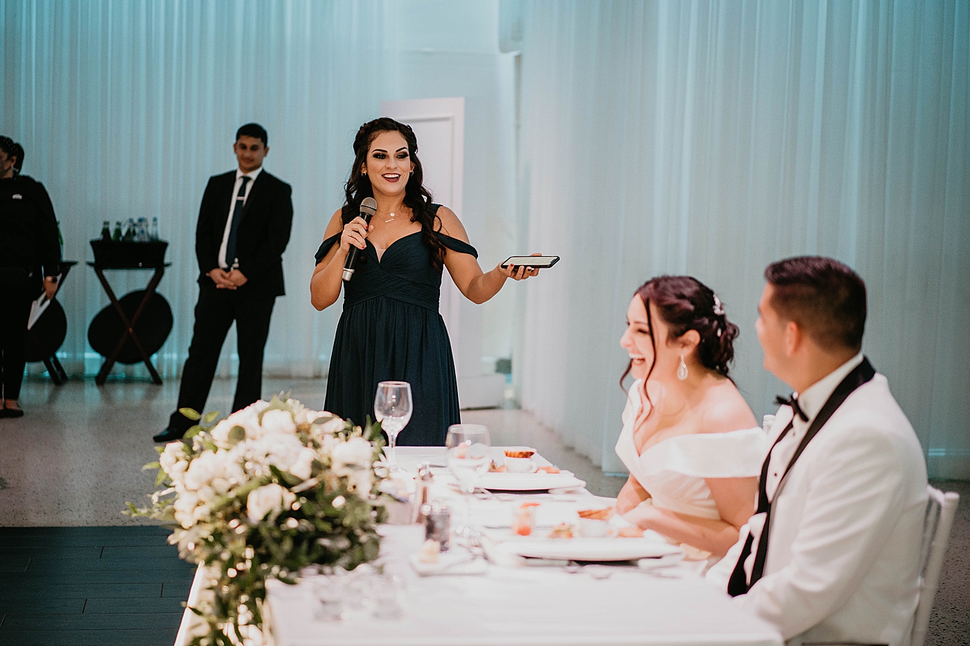 Maid of Honor speech by the sweetheart table Lavan Venue Wedding Photography captured by South Florida Wedding Photographer Krystal Capone Photography