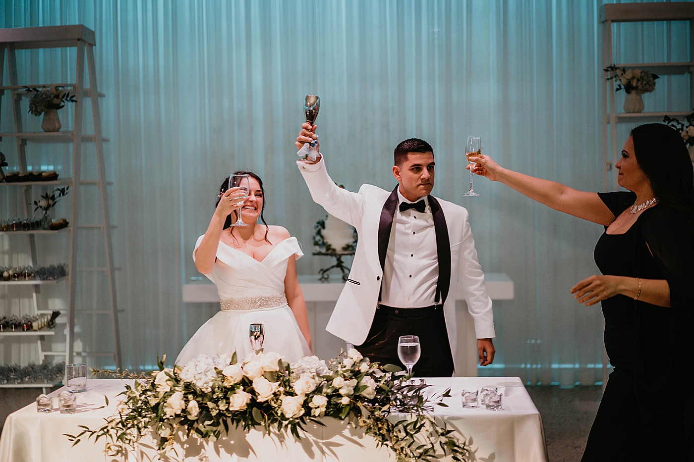 Cheers by Sweetheart table Lavan Venue Wedding Photography captured by South Florida Wedding Photographer Krystal Capone Photography