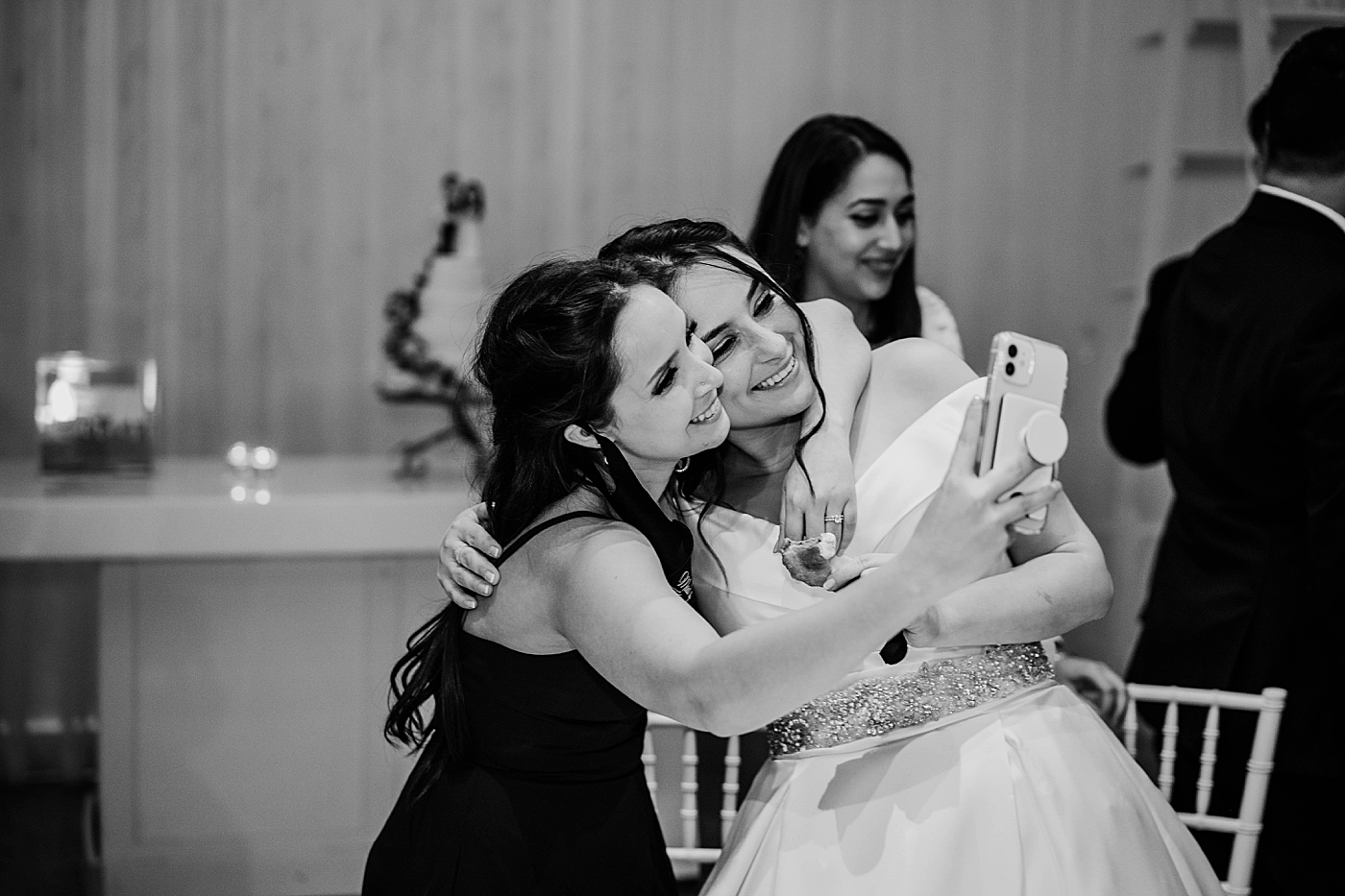 B&W Bride taking a selfie with a friend Lavan Venue Wedding Photography captured by South Florida Wedding Photographer Krystal Capone Photography