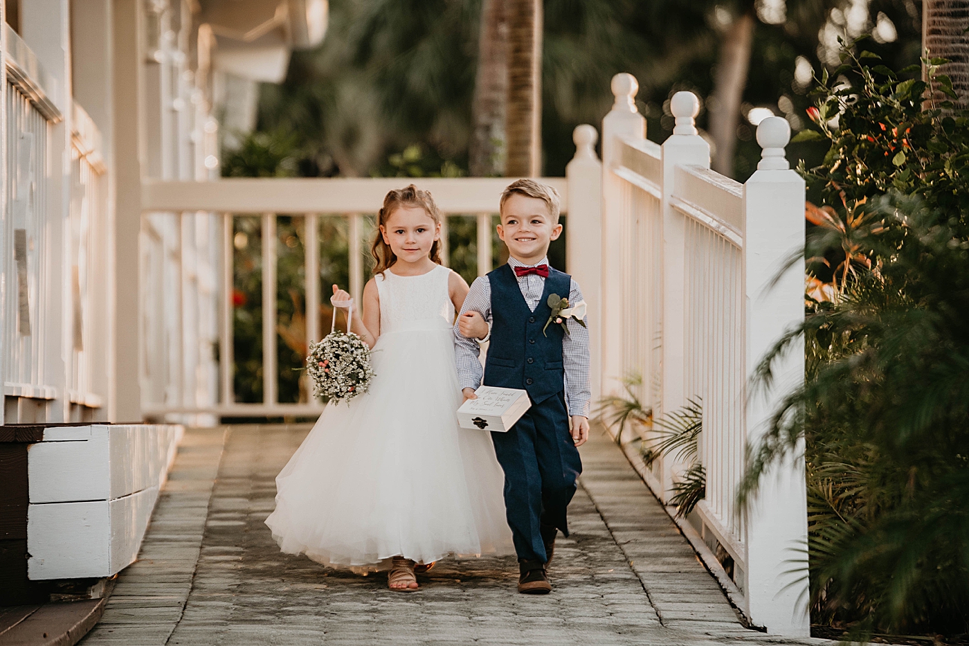 Flower girl and ring bearer portrait Out of the Blue Celebrations Wedding Photography captured by South Florida Wedding Photographer Krystal Capone Photography 