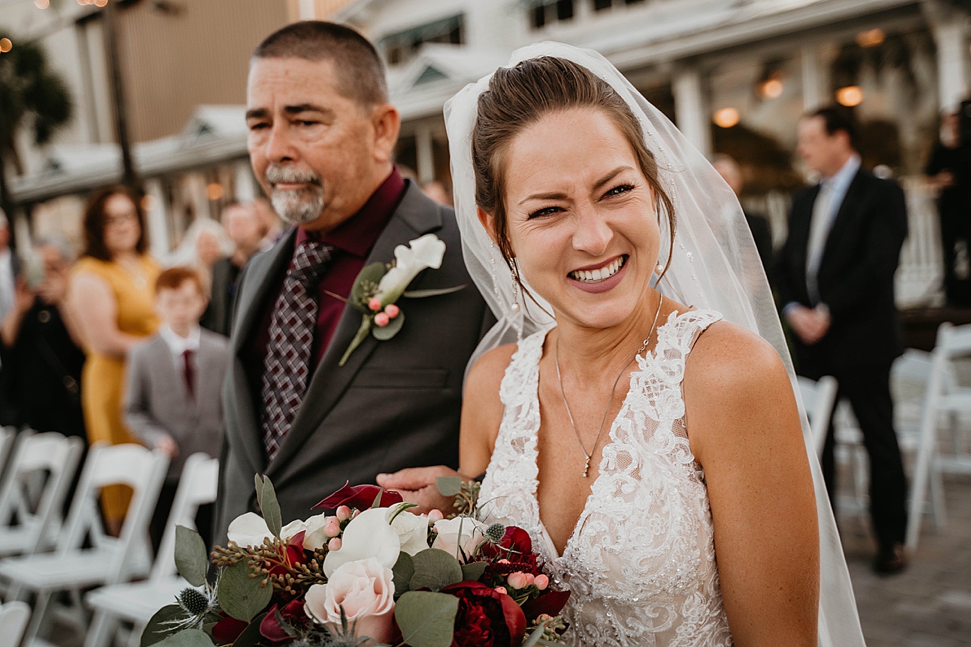 Closeup of Bride and Father entering Ceremony Out of the Blue Celebrations Wedding Photography captured by South Florida Wedding Photographer Krystal Capone Photography 
