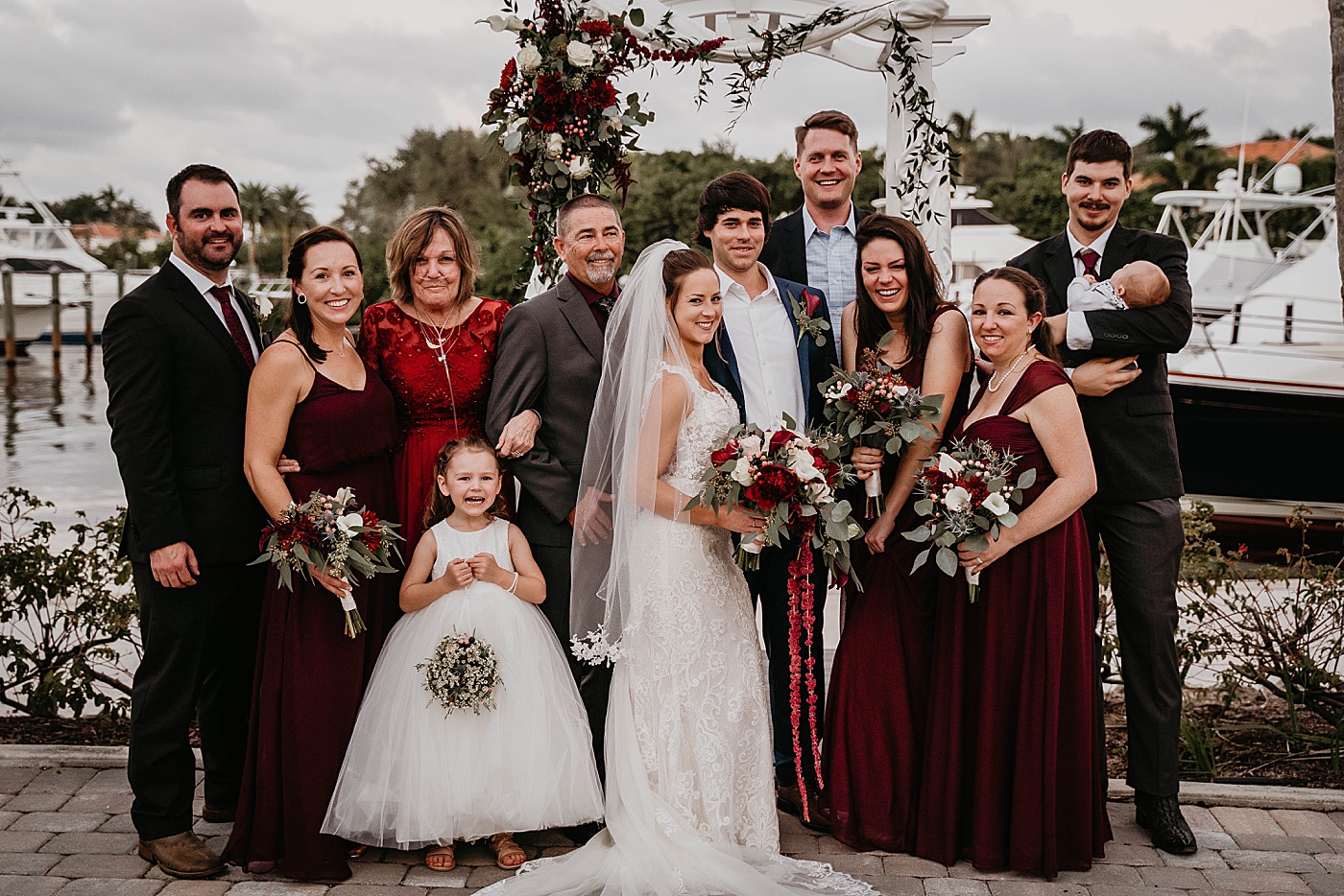 Family portrait with Bride and Groom Out of the Blue Celebrations Wedding Photography captured by South Florida Wedding Photographer Krystal Capone Photography 
