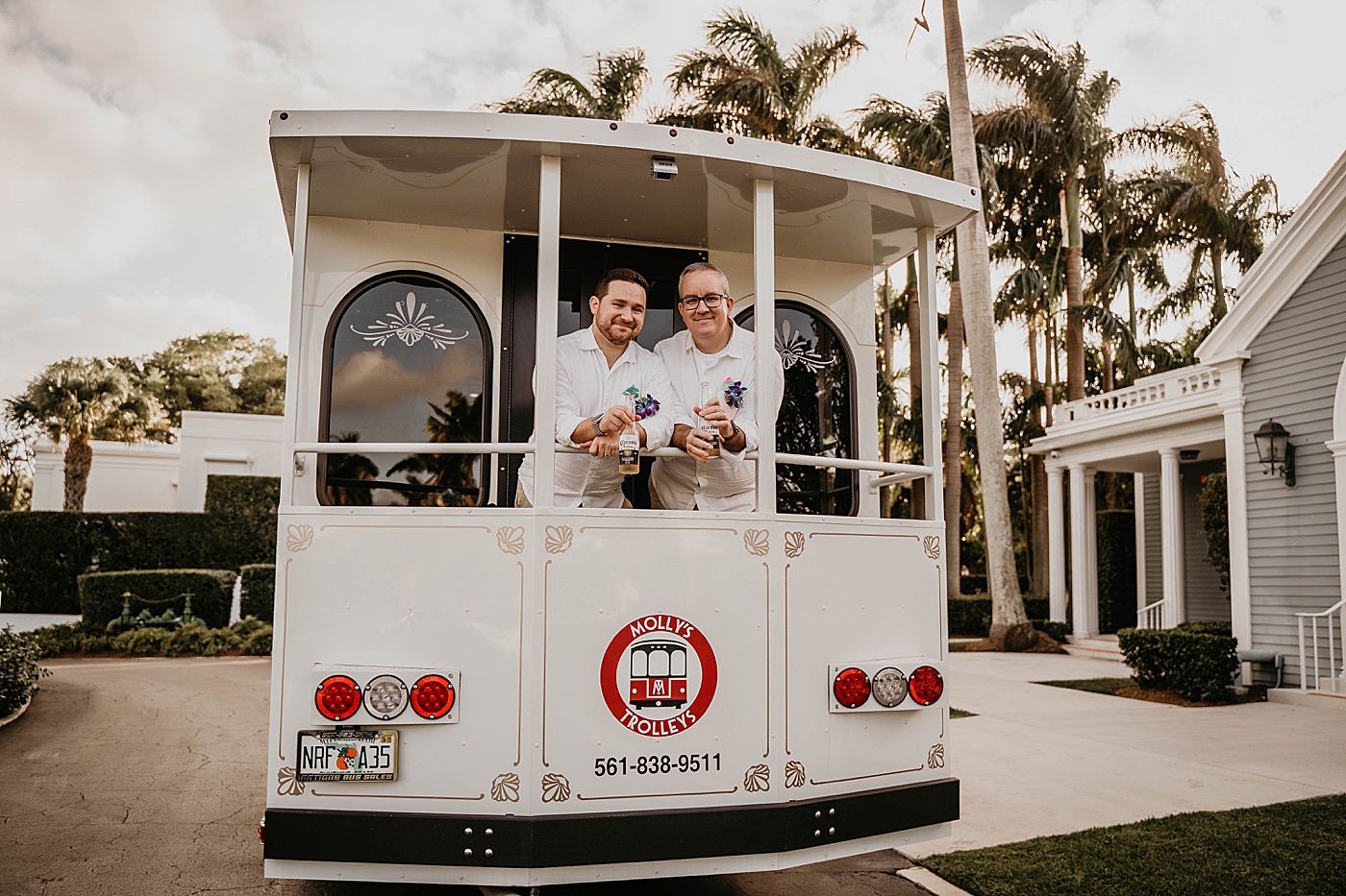 Couple having a drink on Molly's trolley Palm Beach Elopement Photography captured by South Florida Photographer Krystal Capone Photography 