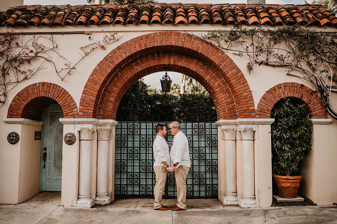 Couple holding hands looking at each other Palm Beach Elopement Photography captured by South Florida Photographer Krystal Capone Photography 