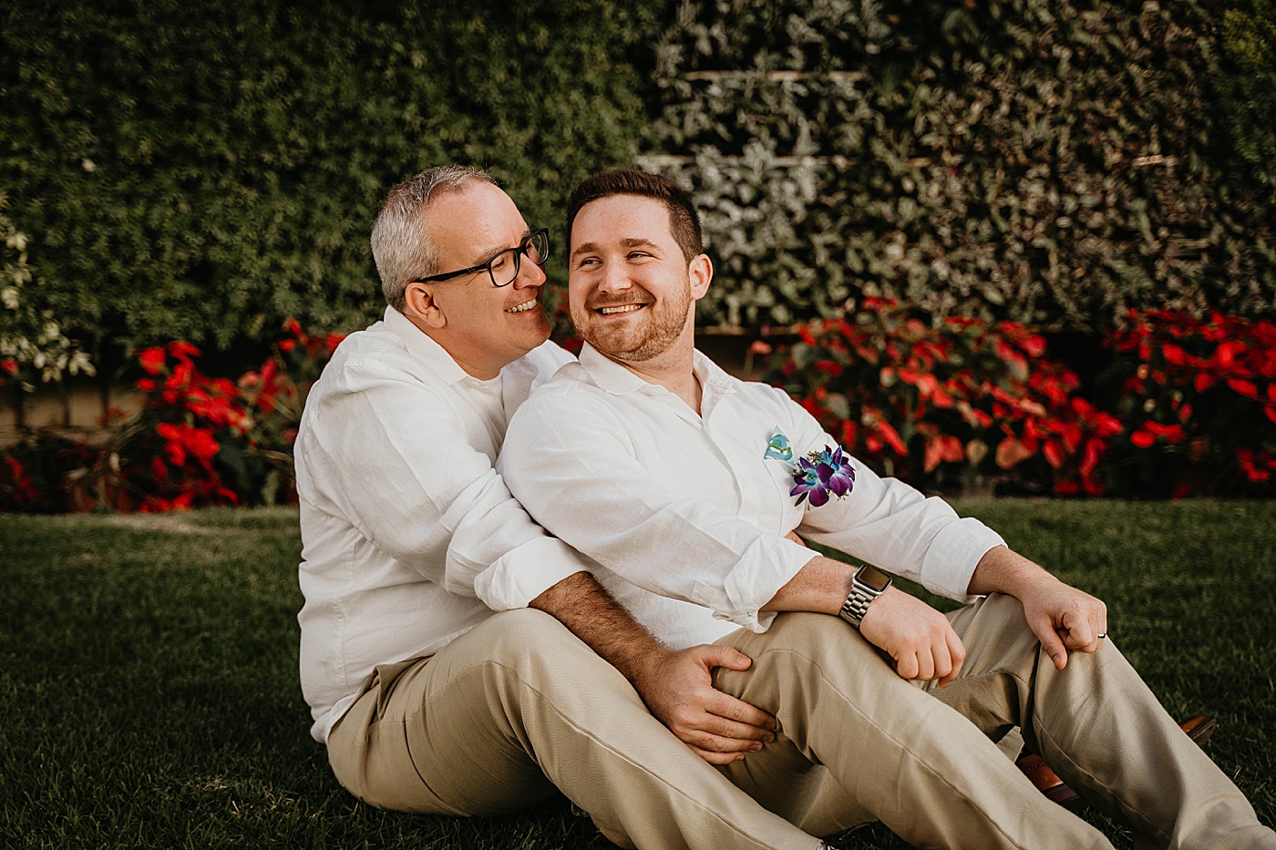Couple sitting in green garden Palm Beach Elopement Photography captured by South Florida Photographer Krystal Capone Photography 