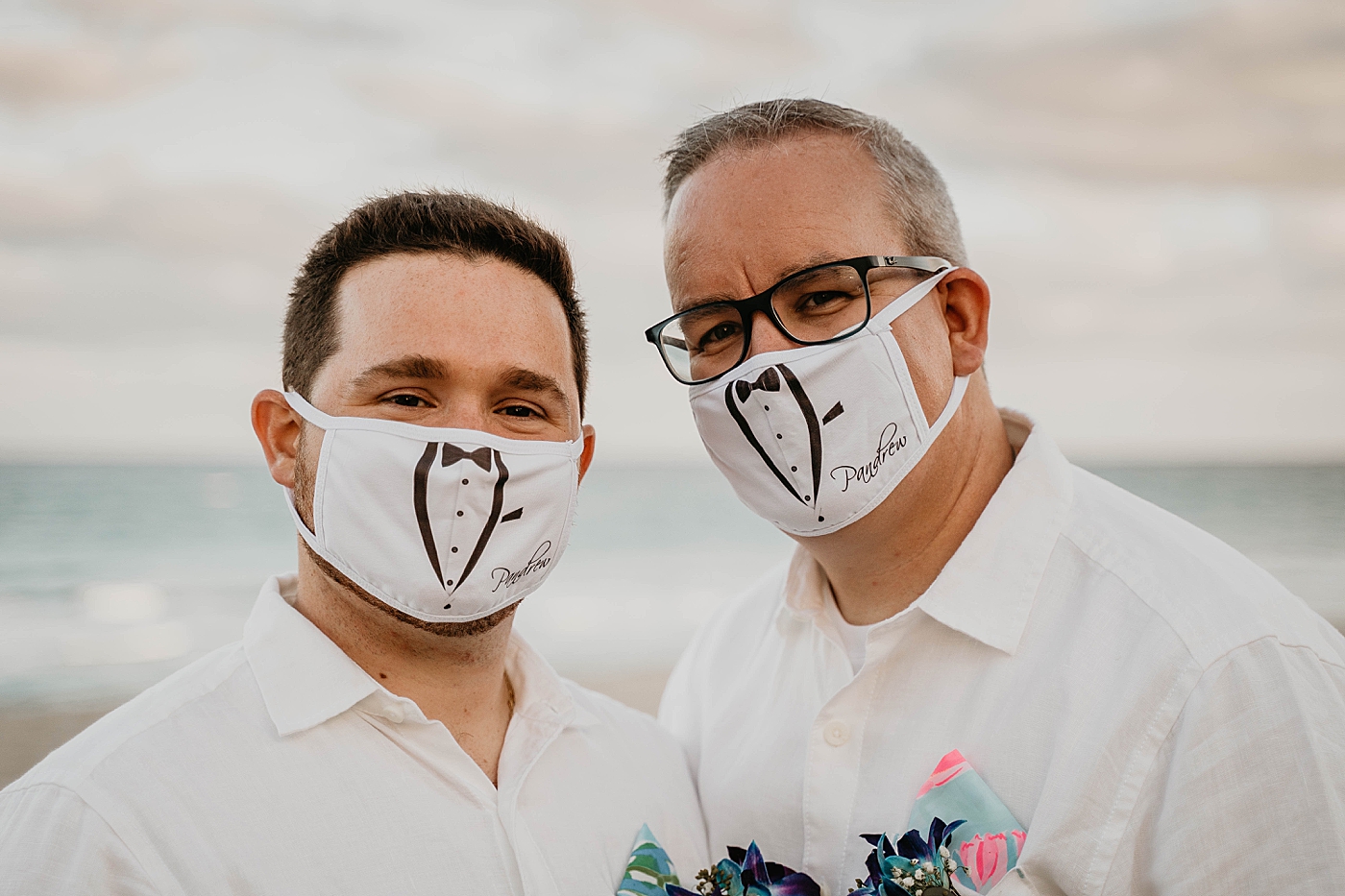 Grooms staying safe with fun suit masks Palm Beach Elopement Photography captured by South Florida Photographer Krystal Capone Photography 