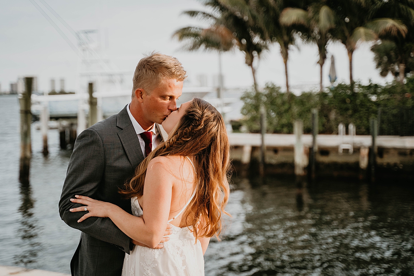 Bride and Groom kissing each other South Florida Elopement Photography captured by Krystal Capone Photography