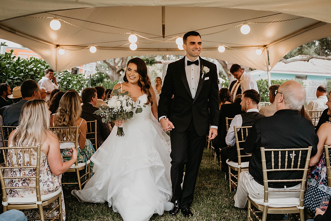 Bride and Groom going down the aisle Intimate South Florida Wedding Photography captured by Wedding Photographer Krystal Capone Photography