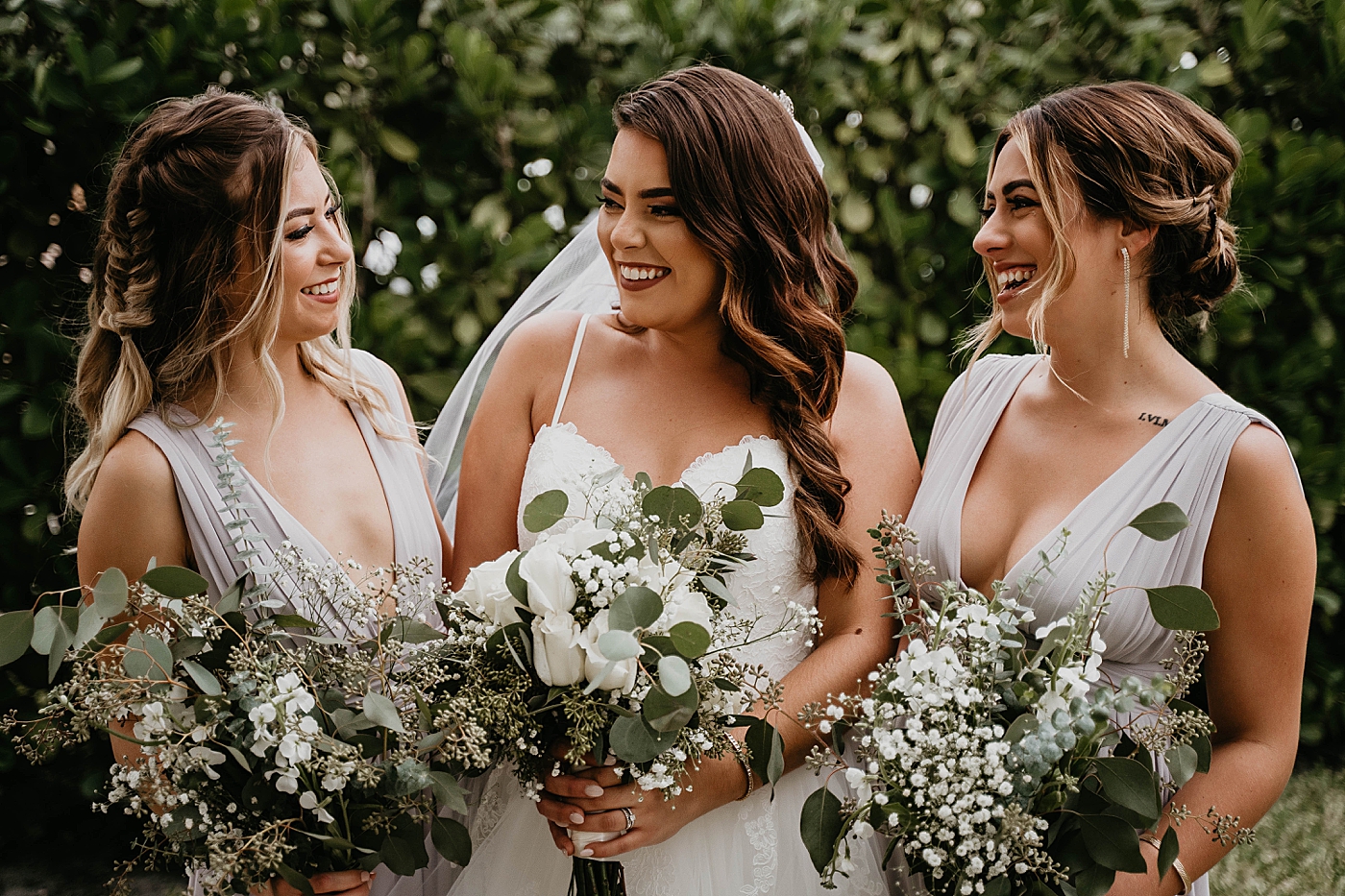 Bride with Bridesmaids with bouquets Intimate South Florida Wedding Photography captured by Wedding Photographer Krystal Capone Photography