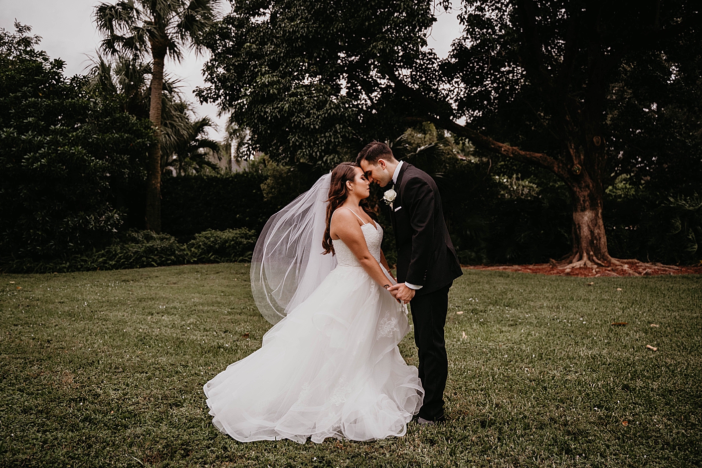 Bride and Groom holding each other close Intimate South Florida Wedding Photography captured by Wedding Photographer Krystal Capone Photography