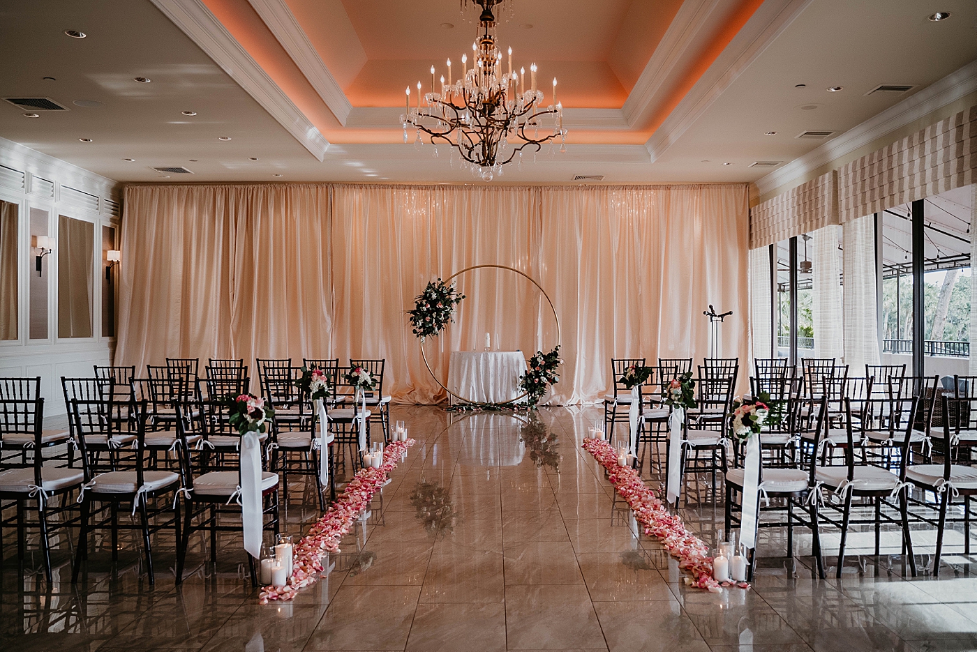 Ceremony detail shot with circle flora centerpiece Breakers West Wedding Photography captured by South Florida Wedding Photographer Krystal Capone Photography 
