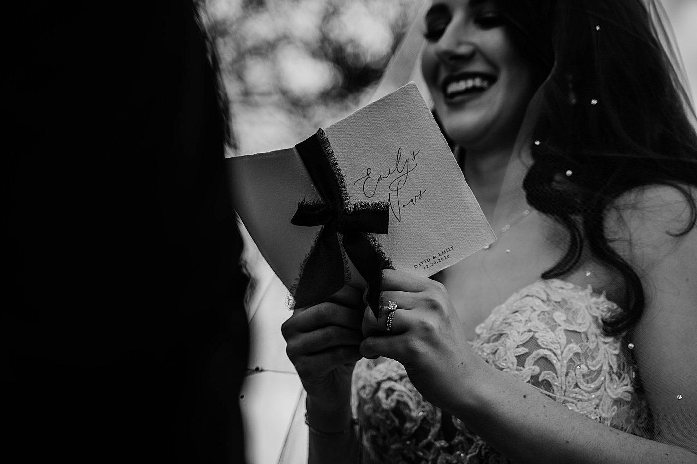 Black and White shot of Bride reading vow book Breakers West Wedding Photography captured by South Florida Wedding Photographer Krystal Capone Photography 