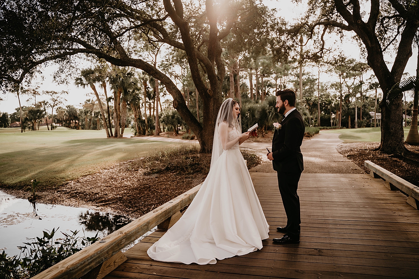 Bride giving vows to Groom on bridge Breakers West Wedding Photography captured by South Florida Wedding Photographer Krystal Capone Photography 