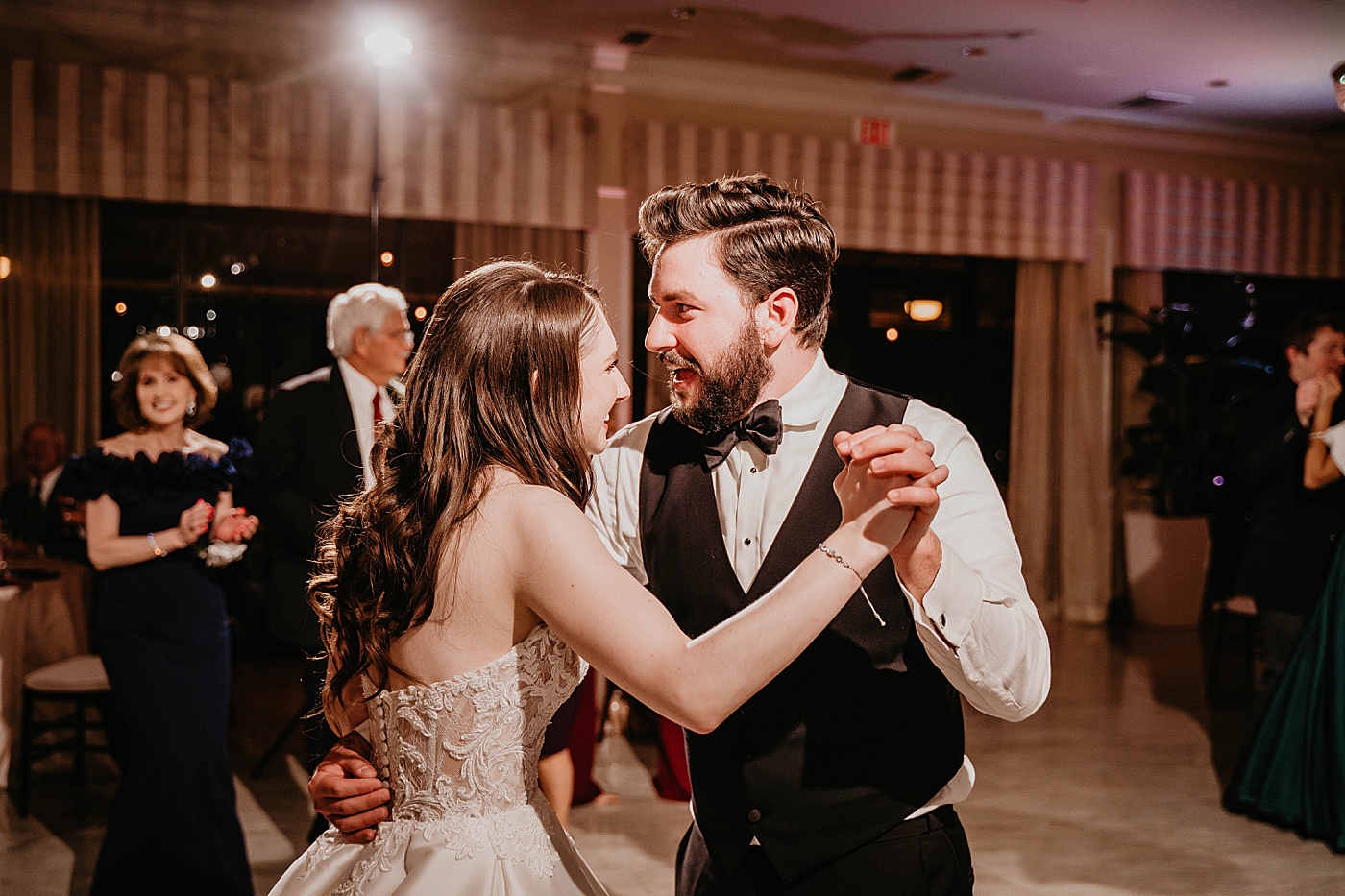 Bride and Groom dancing at reception Breakers West Wedding Photography captured by South Florida Wedding Photographer Krystal Capone Photography 