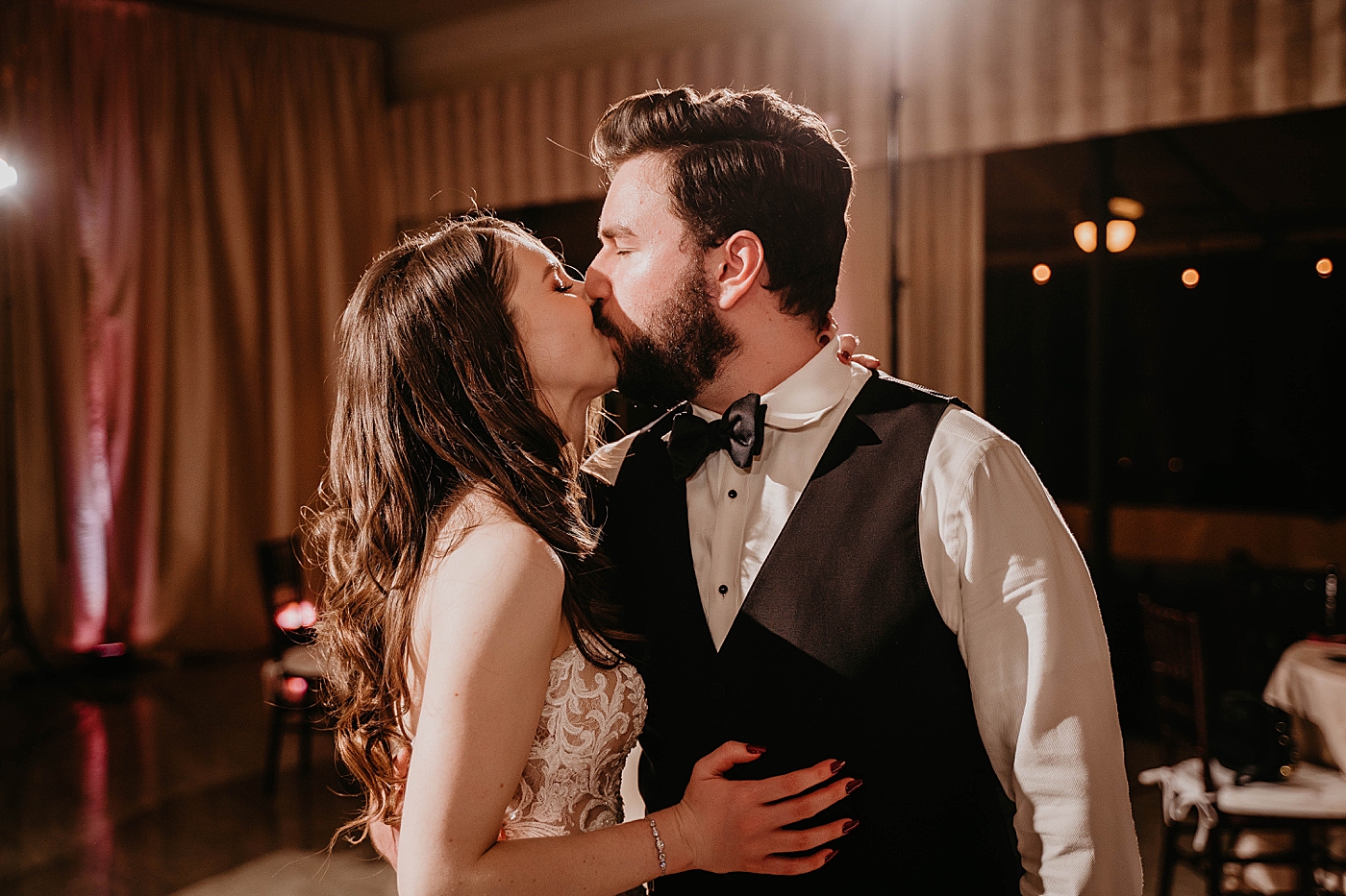 Bride and Groom kissing at Reception Breakers West Wedding Photography captured by South Florida Wedding Photographer Krystal Capone Photography 