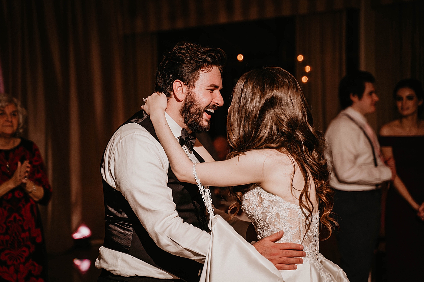 Bride and Groom dancing at reception Breakers West Wedding Photography captured by South Florida Wedding Photographer Krystal Capone Photography 