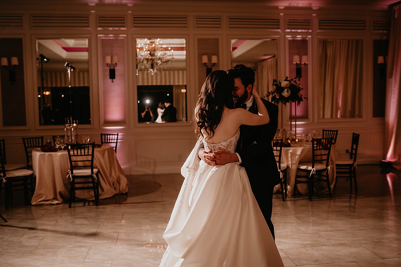 Bride and Groom sharing last dance at reception Breakers West Wedding Photography captured by South Florida Wedding Photographer Krystal Capone Photography 
